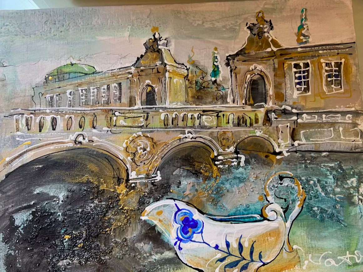 A watercolor painting of a historic bridge over a river, with ornate architectural details, a boat in the foreground, and a sky background.