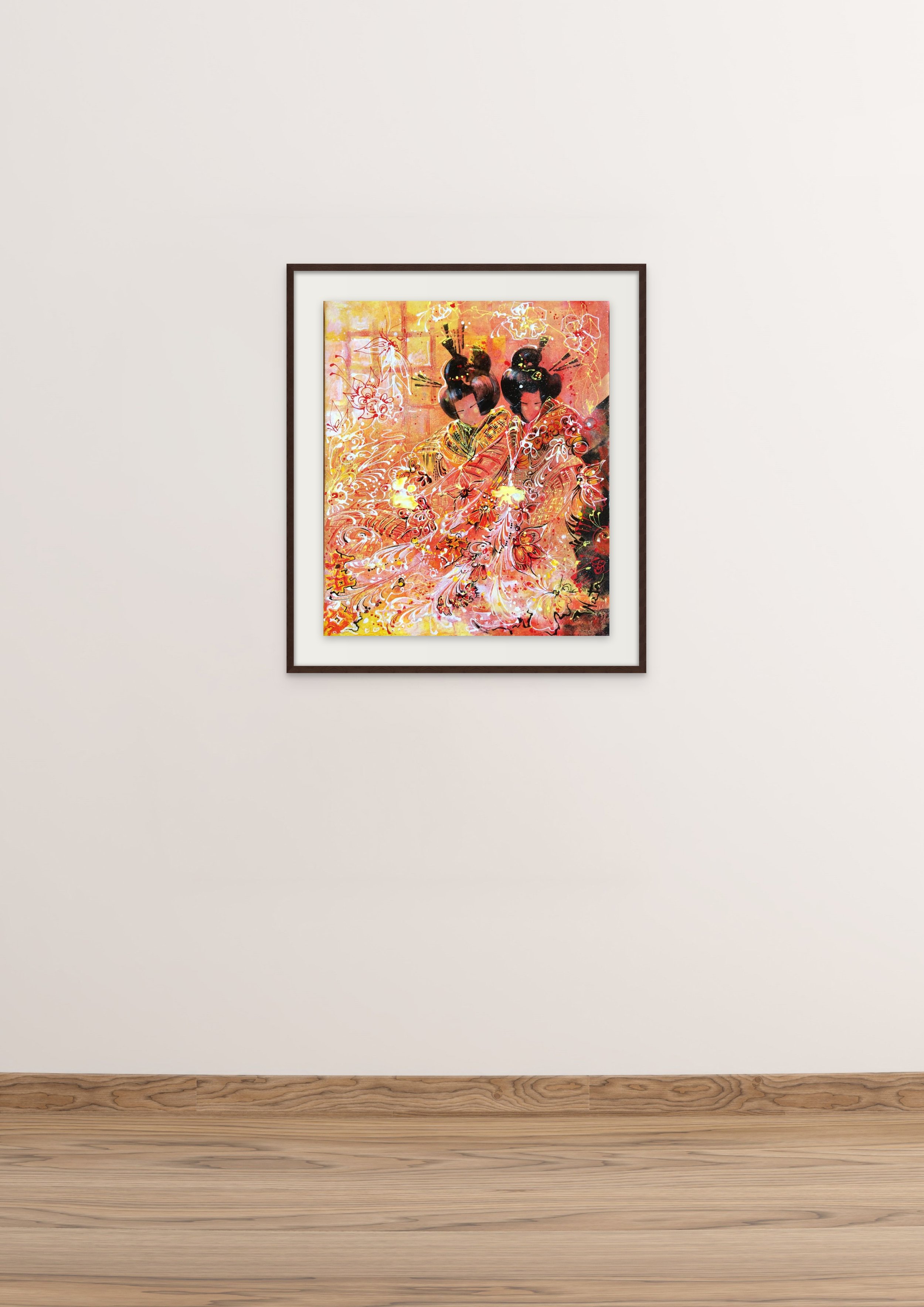 A framed colorful artwork depicting two women in traditional Japanese kimonos with elaborate hairstyles, surrounded by intricate patterns and bright colors, hanging on a plain white wall in an art gallery.