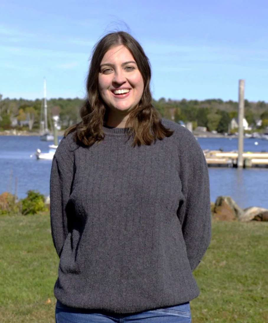 Photo of Madison Cook standing by thtoe water in Belfast. Madison is running to serve in the Maine State House of Representatives for District 39, which includes Belfast, Belmont, and Northport.