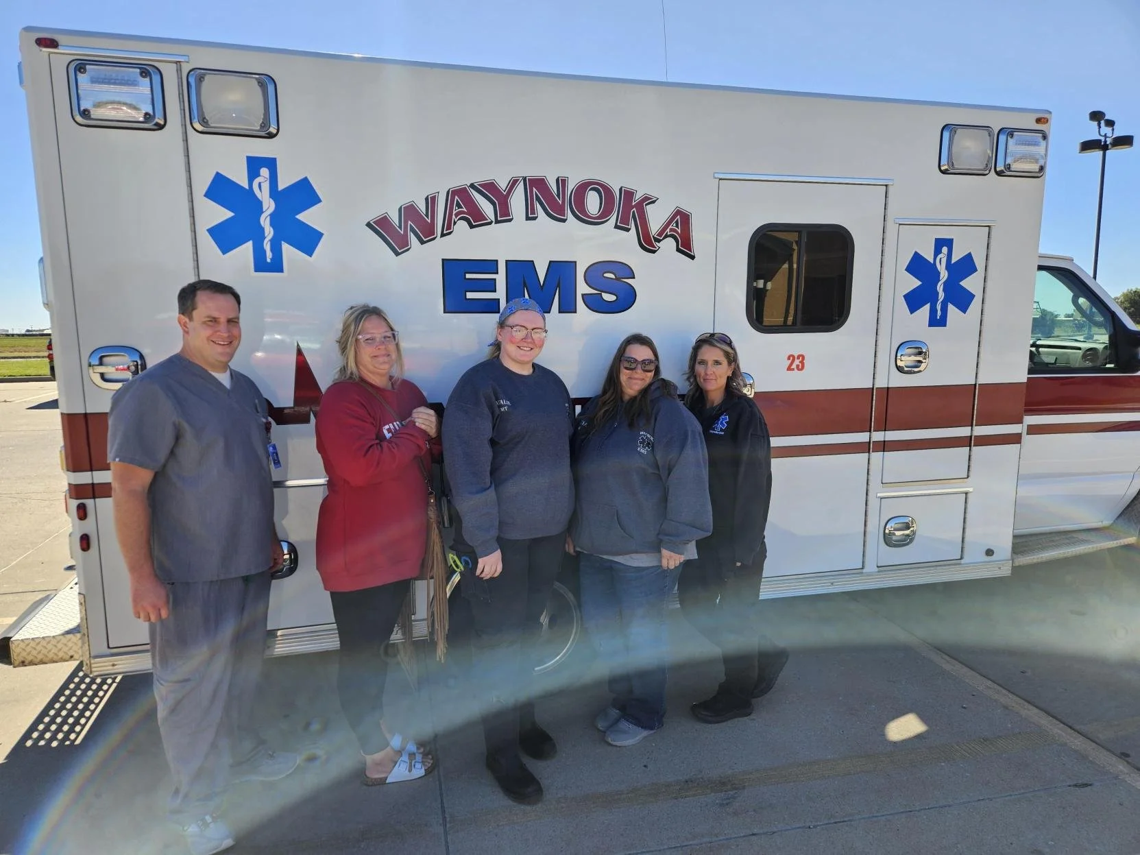 Emergency Responders in front of an ambulance