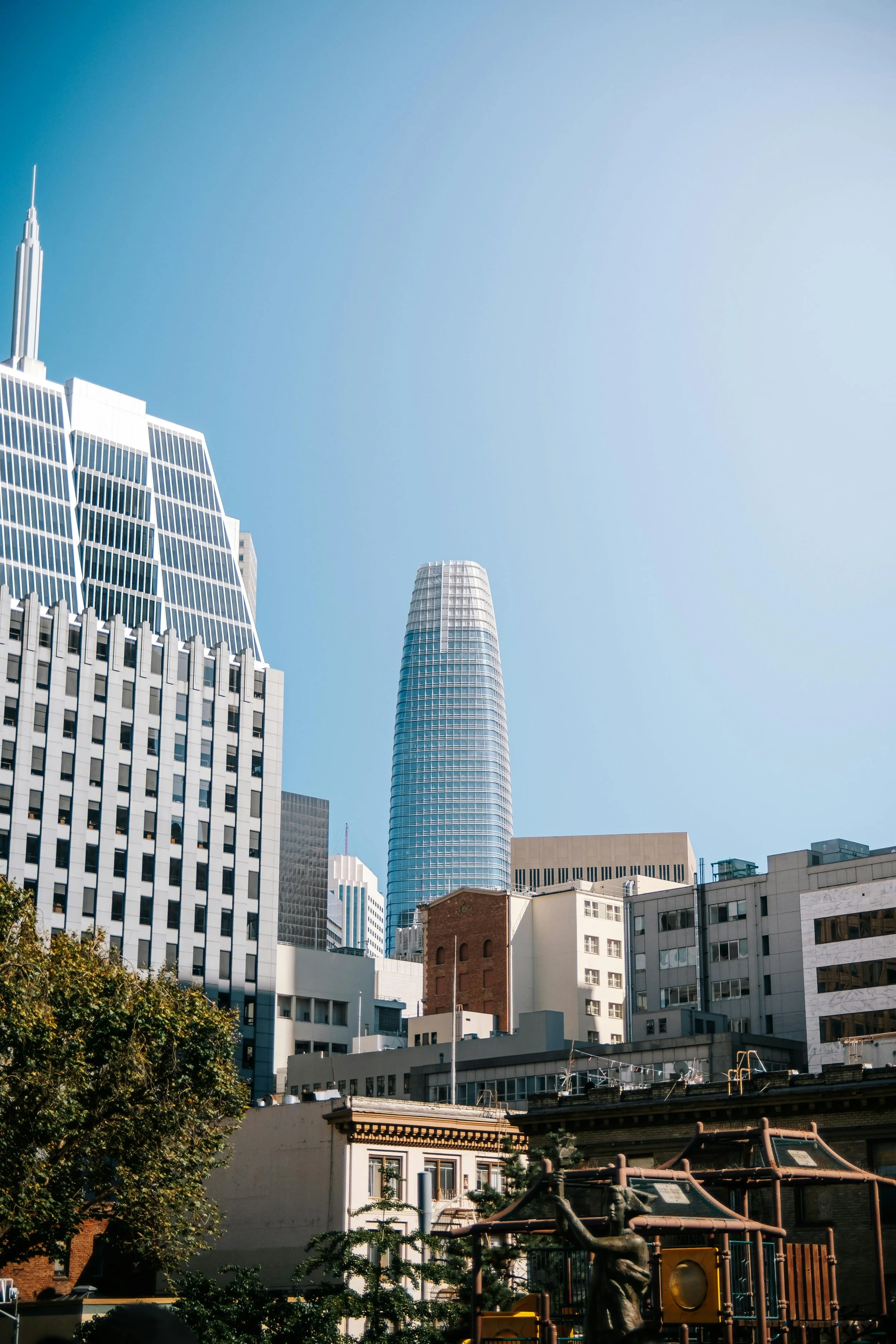 Street view of Bay Area streets and commercial buildings, representing RK Roofing’s HUBZone and government contracting coverage.