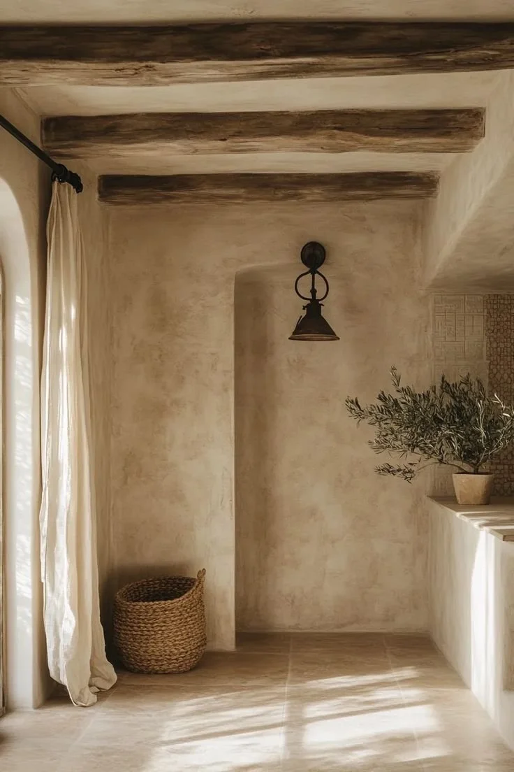 limewash plaster walls Mediterranean interior warm white texture California home