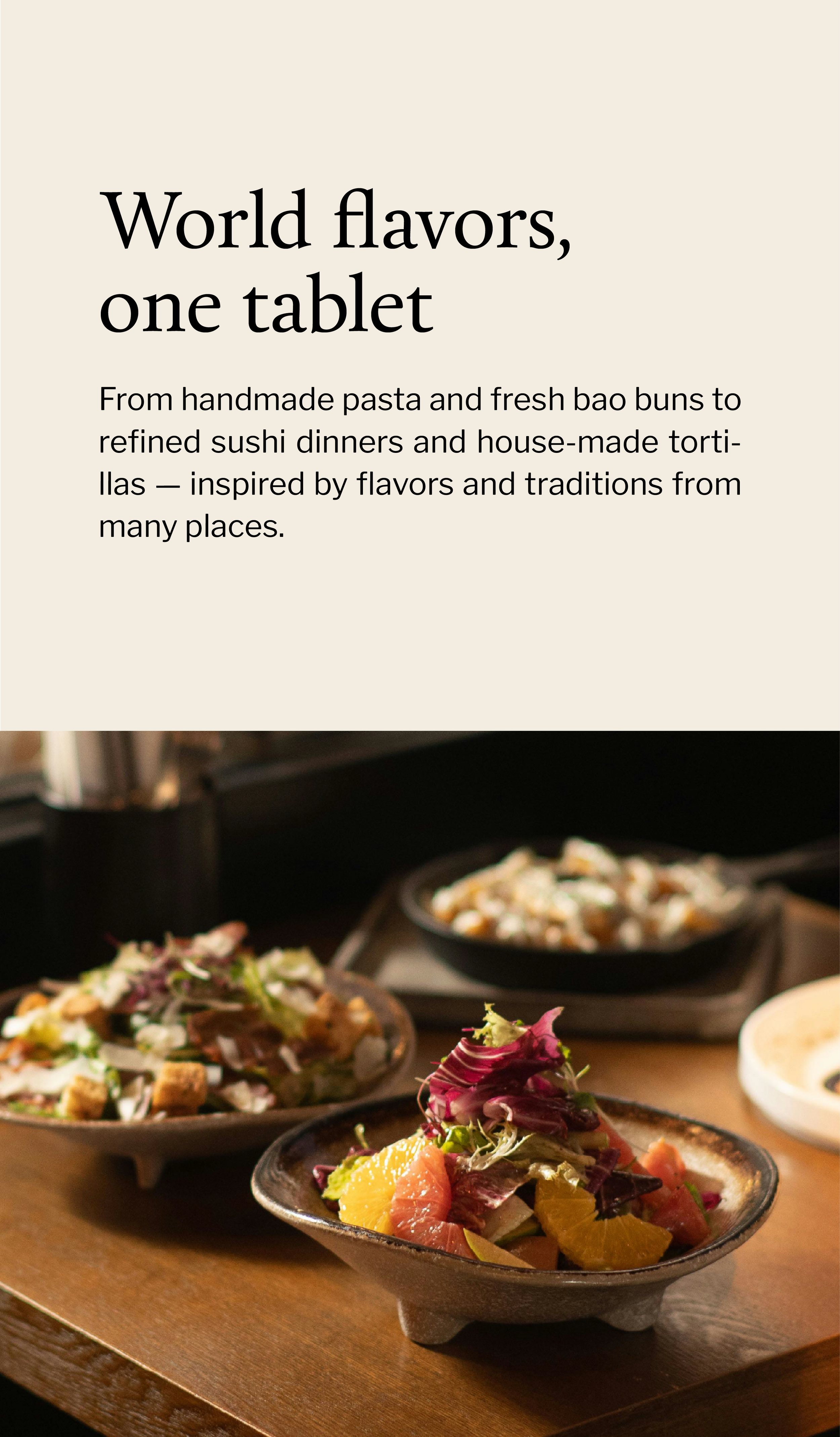 A close-up of a variety of Japanese dishes served in small bowls on a wooden tray, including a vibrant sashimi salad with citrus slices and microgreens in the foreground, with other salads and dishes in the background.