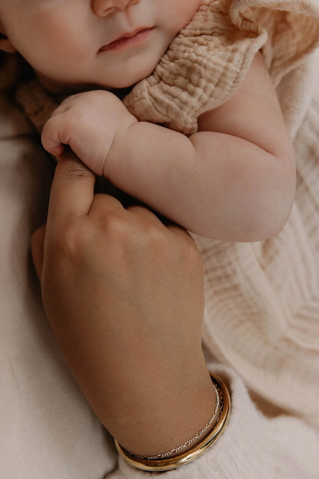 dominique bishop, holding baby, postpartum
