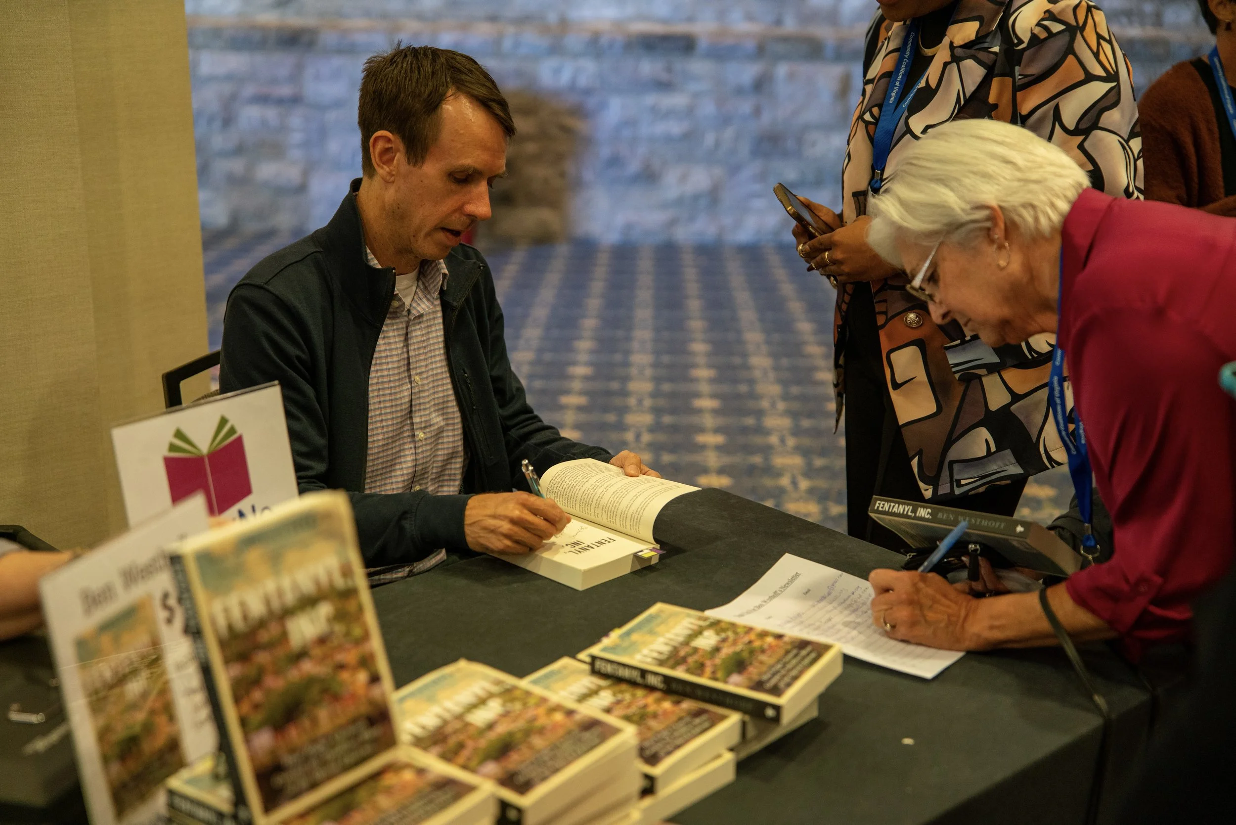 Ben Westhoff signing copies of his book, Fentanyl, Inc