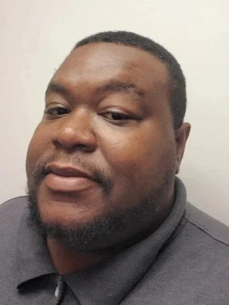 Headshot of Dwayne Delaney