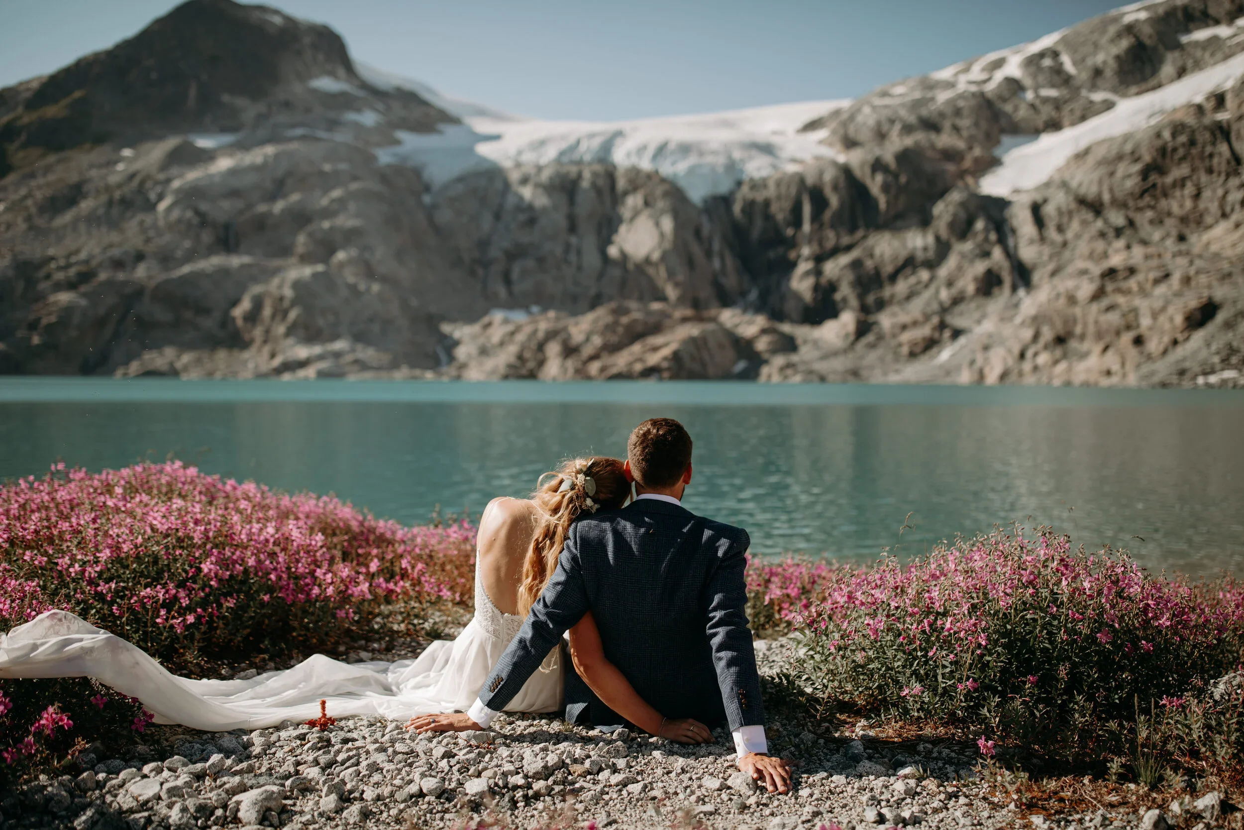 Couple enjoying view of Ipsoot Icefield during warmer months.