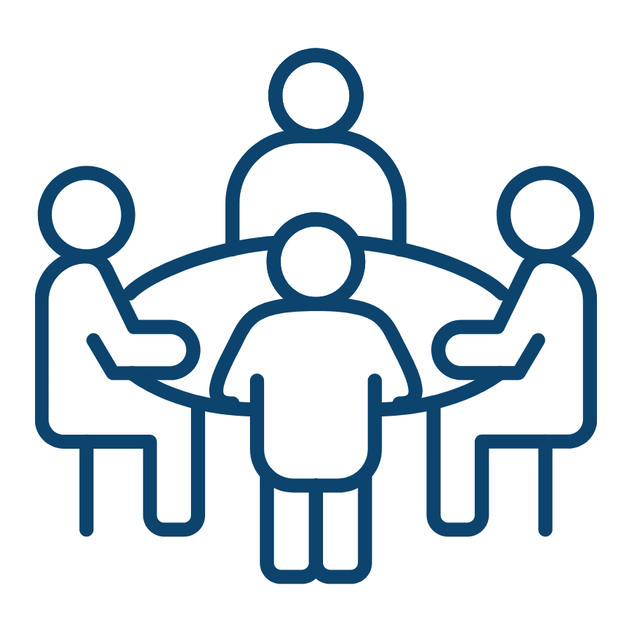 Line drawing of four people sitting around a round table, engaged in discussion or meeting.