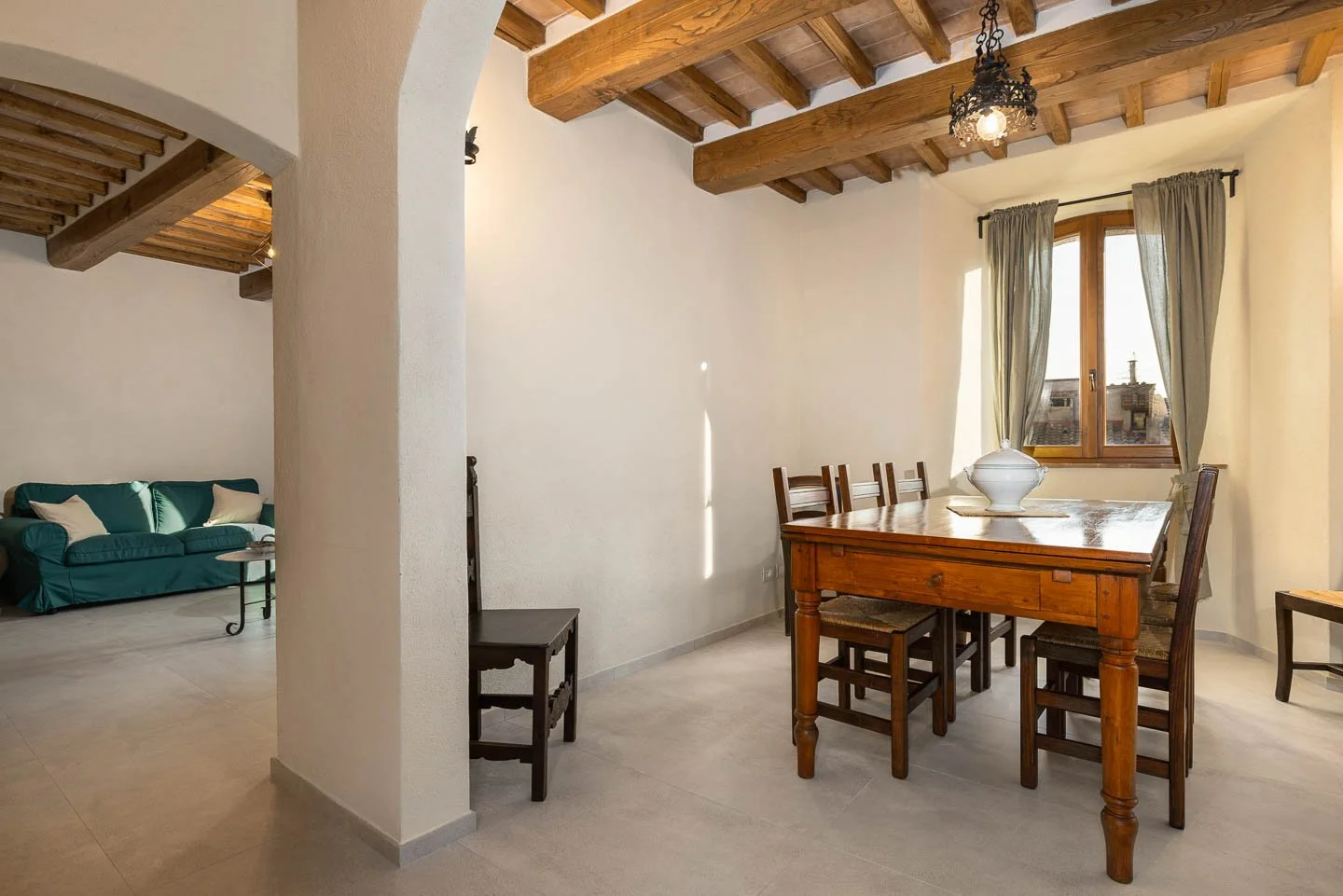 Dining area in a luxury holiday apartment in San Gimignano historic center, Tuscany