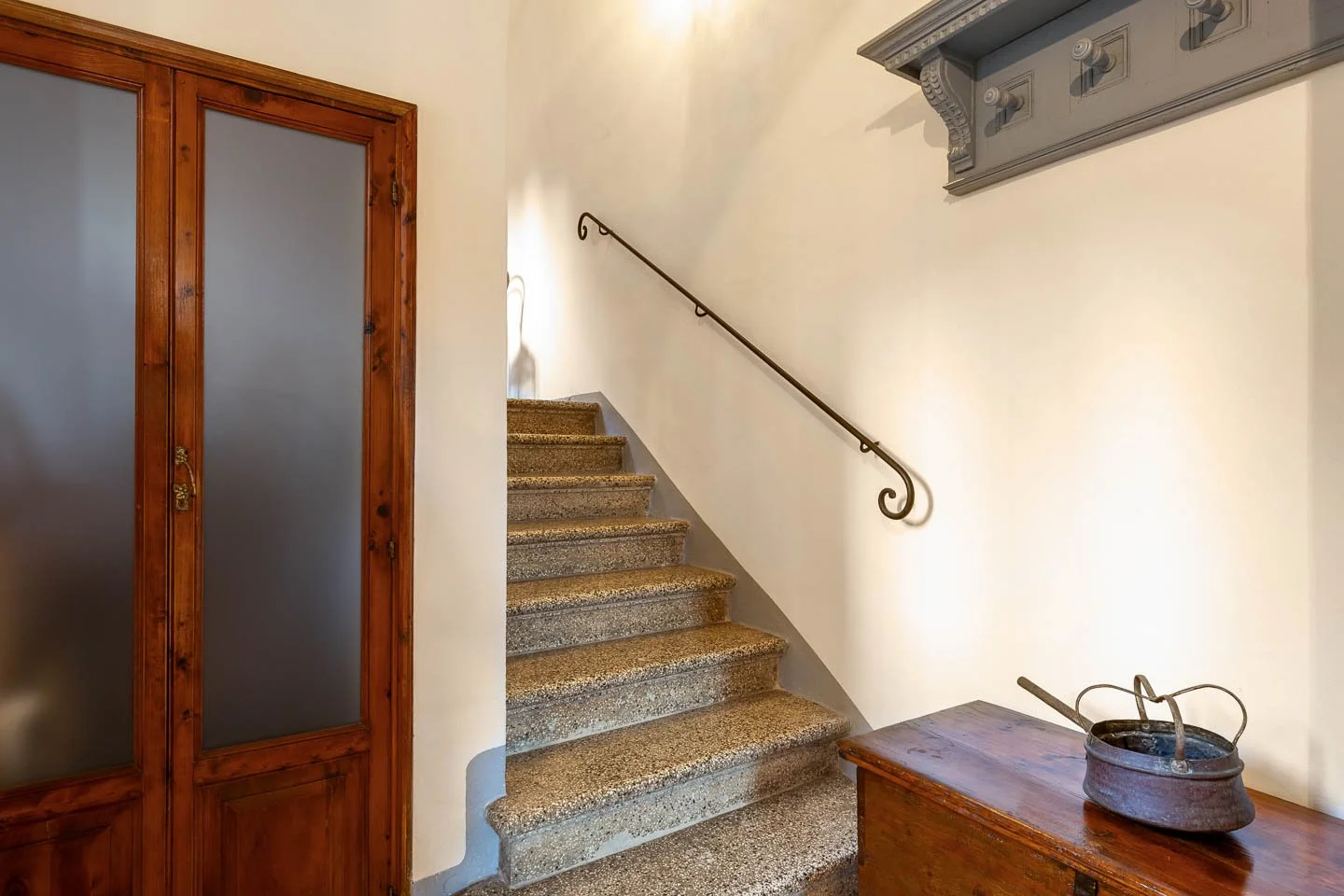 Interior staircase in a high-end holiday apartment in the historic center of San Gimignano