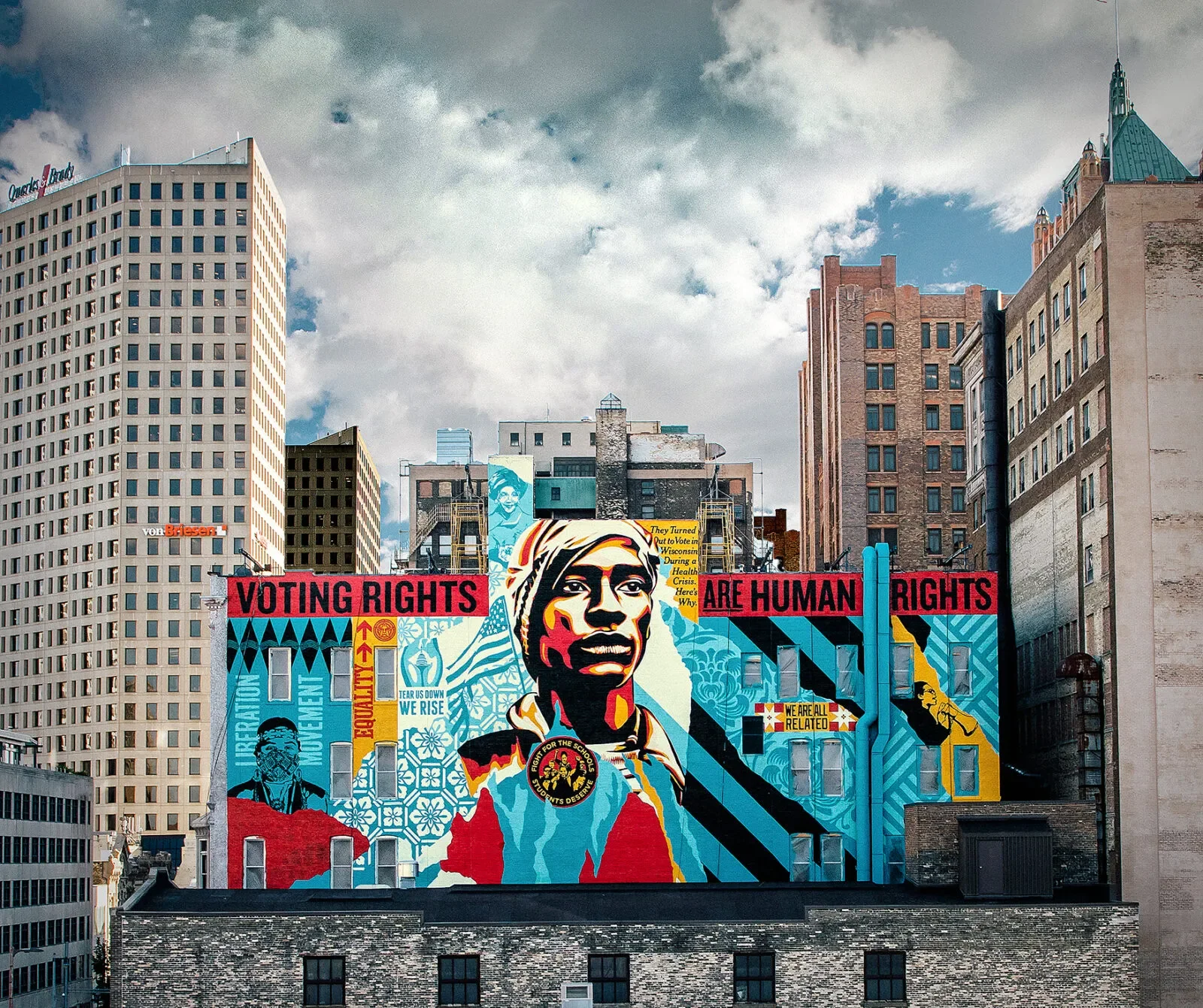 mural on the side of a building that states, "voting rights are human rights"