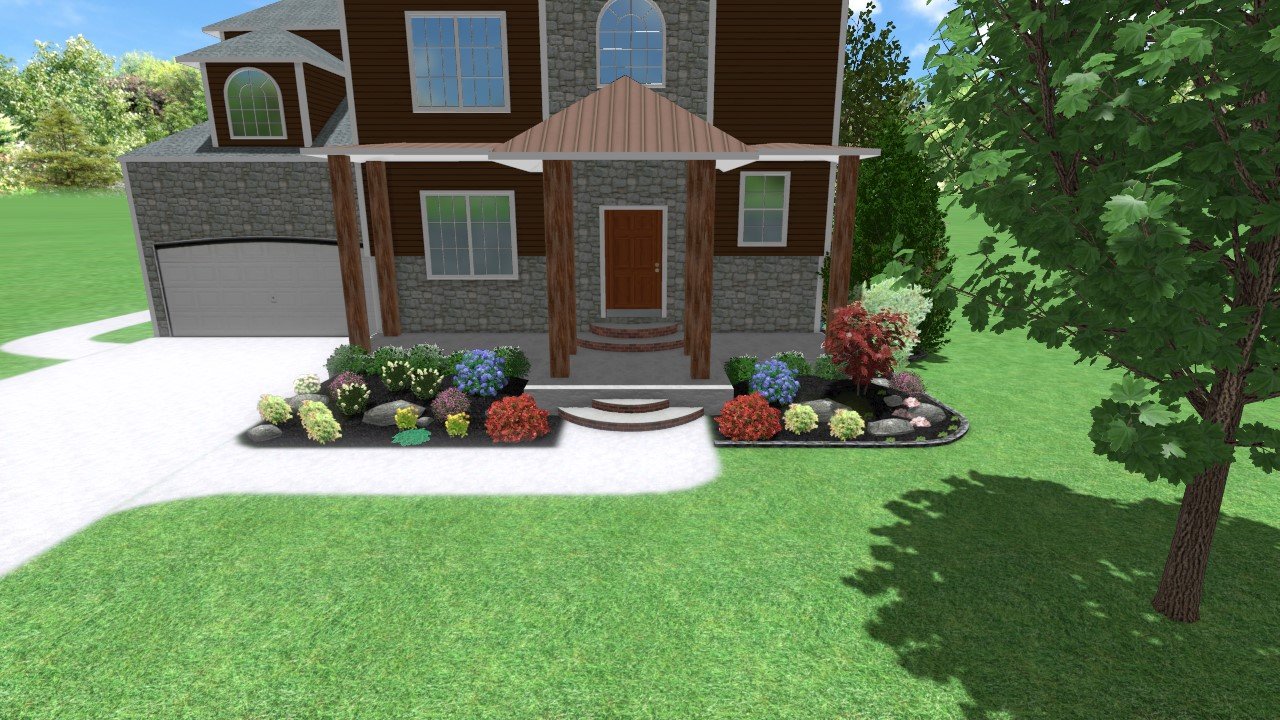 A house with a stone and wood exterior, a front porch with wooden columns and steps, and a flower garden in front with various colorful flowers and plants. There is a driveway to the left and a large tree on the right.