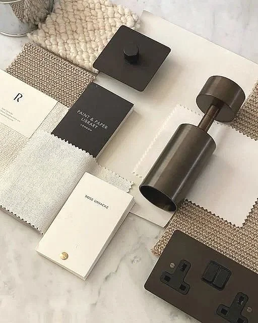 A carefully curated mood board capturing the textures, colours, and finishes for a project from fabrics to fittings and lighting details.