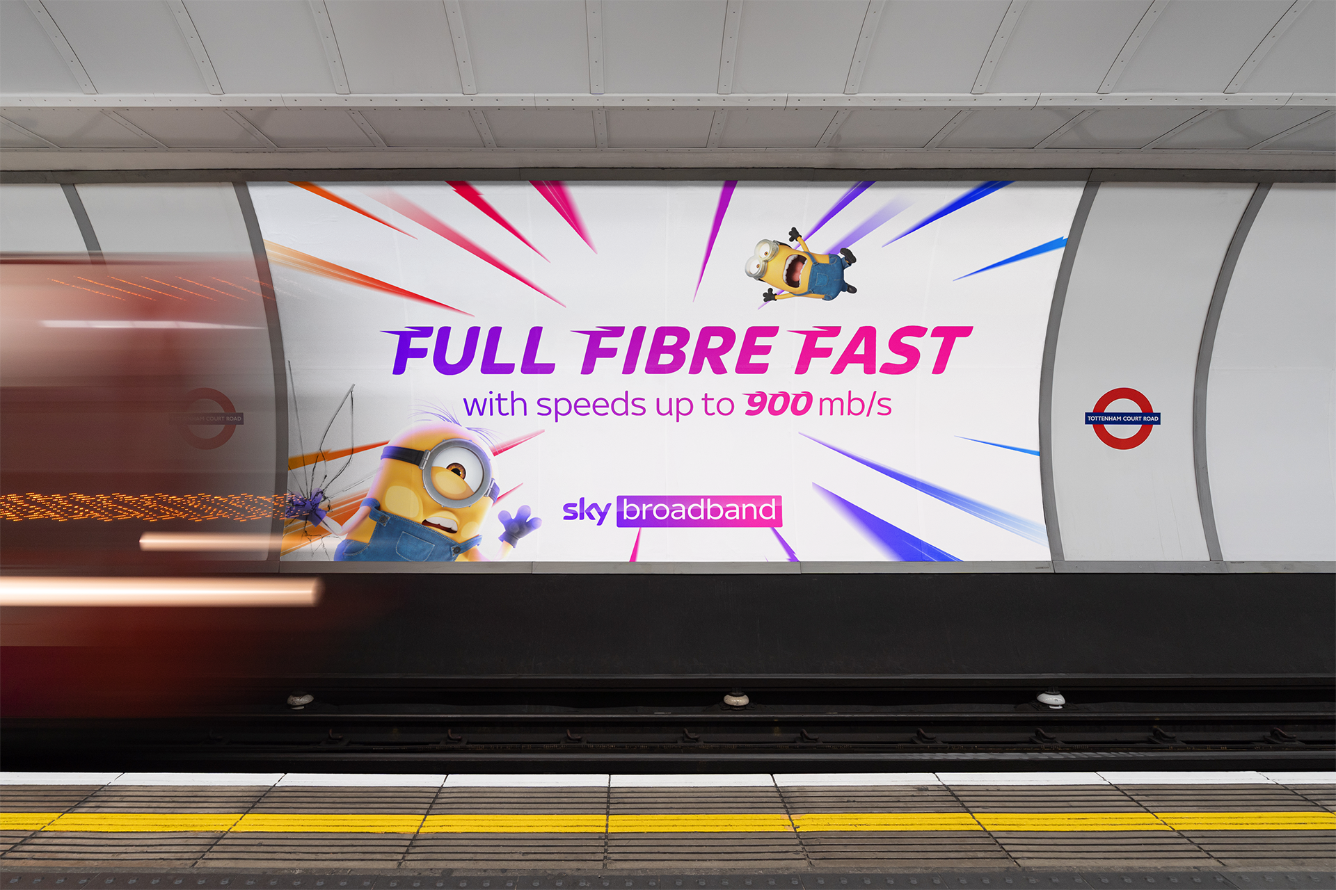Advertisement for Sky Broadband featuring Minions, highlighting full fiber fast internet with speeds up to 900 mb/s at Tottenham Court Road subway station.