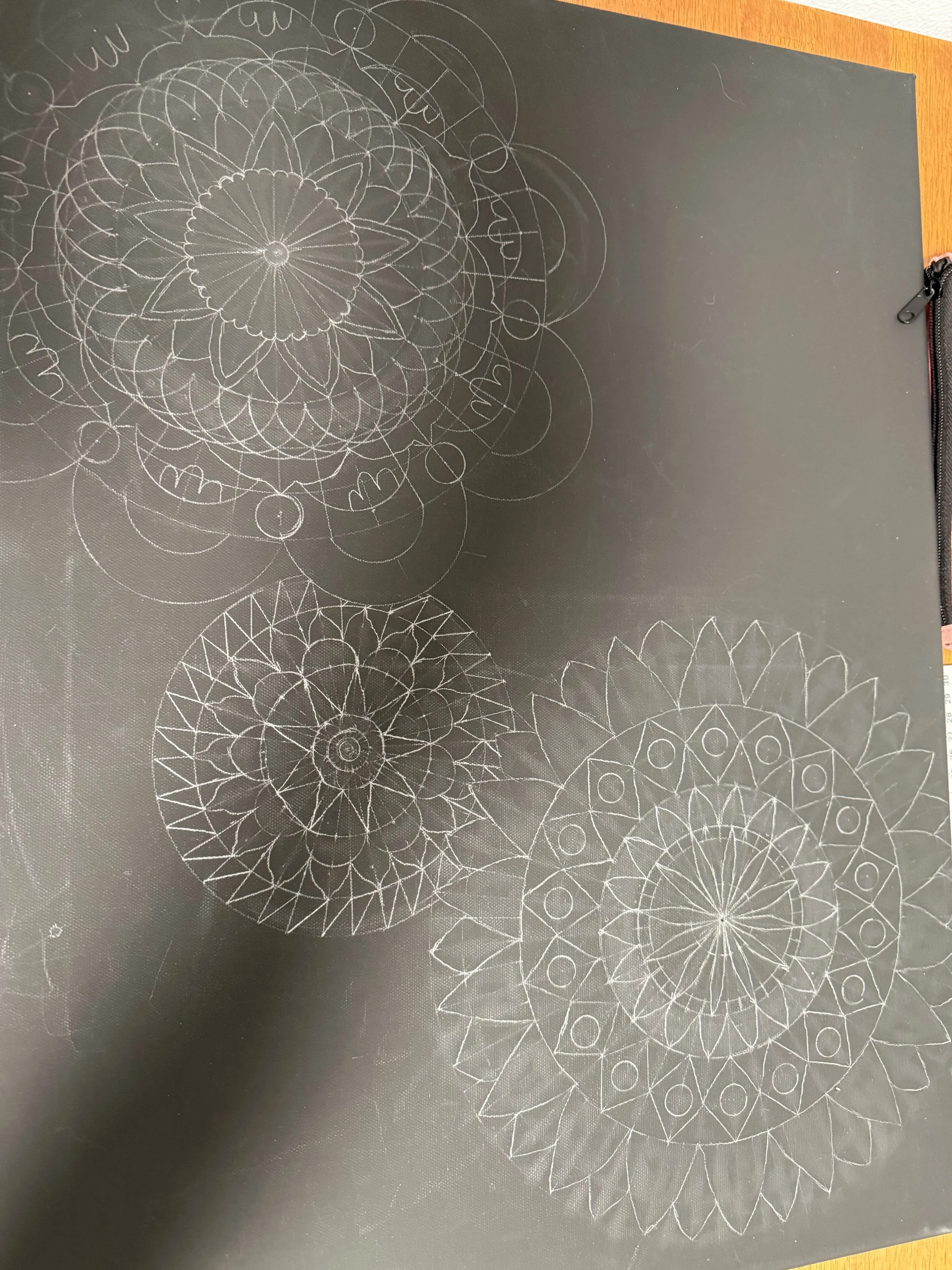 This is the beginning stage of one of my mandala pieces. It took me two and a half hours to draw but it is now ready for the painting stage.