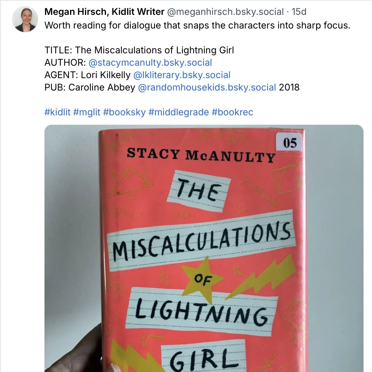 A hand holding a book with a primarily bright orange cover. There are algebra, geometry, and calculus formulas scribbled on the cover. It says "The Miscalculations of Lightning Girl."