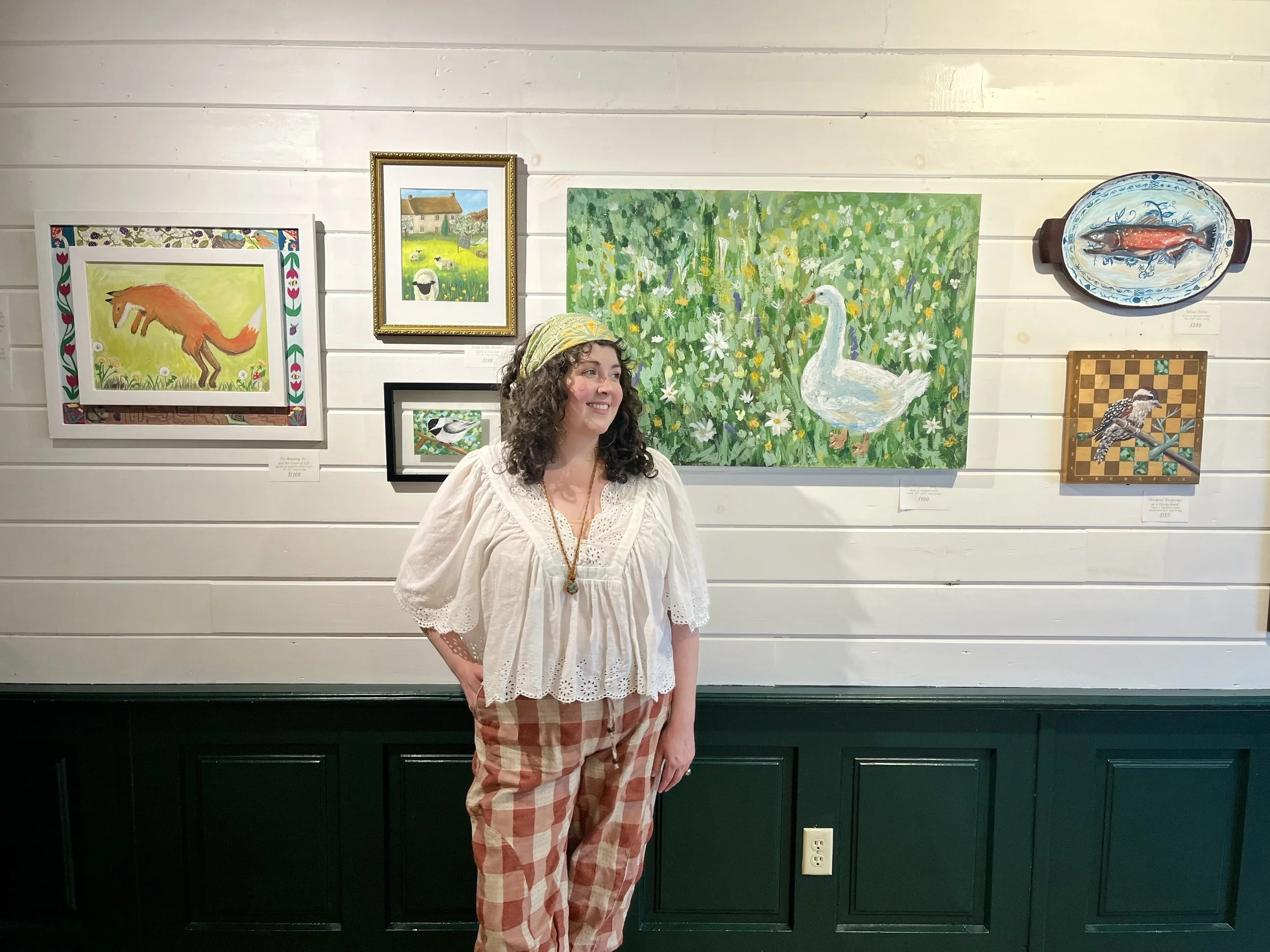 The artist, Bailey Gillreath-Brown, at her Menagerie exhibit at Delaney's Pub during the Westville Artwalk, 2026.