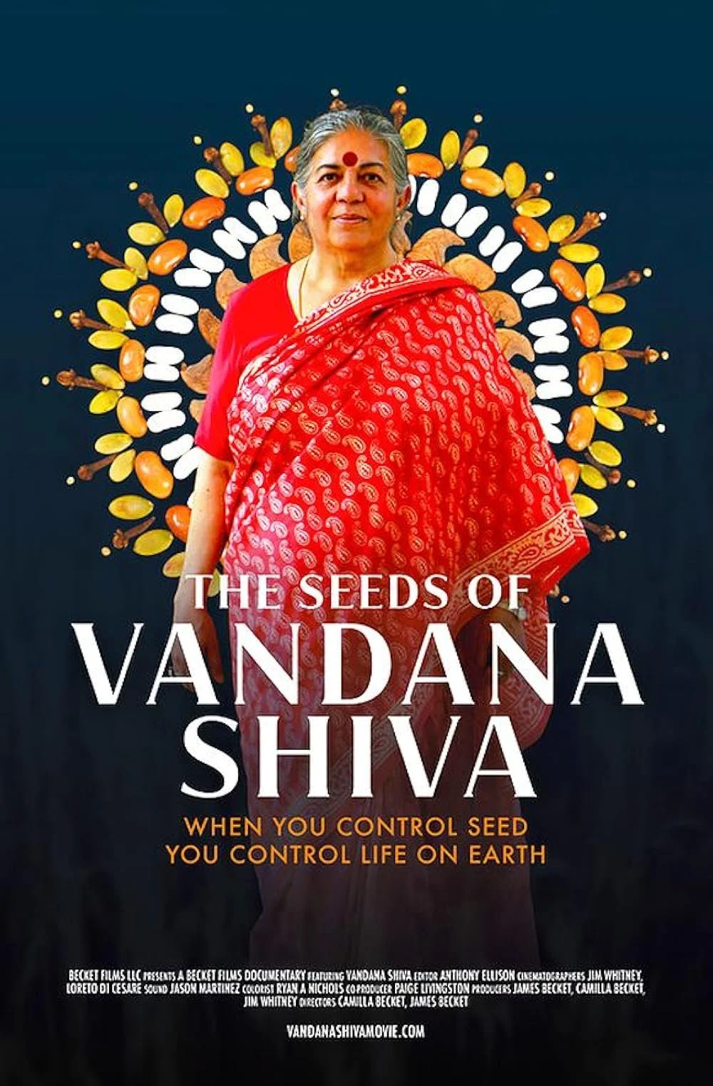 Cover of a documentary titled 'The Seeds of Vandana Shiva' showing Vandana Shiva in a red saree with a circular sunflower pattern in the background.