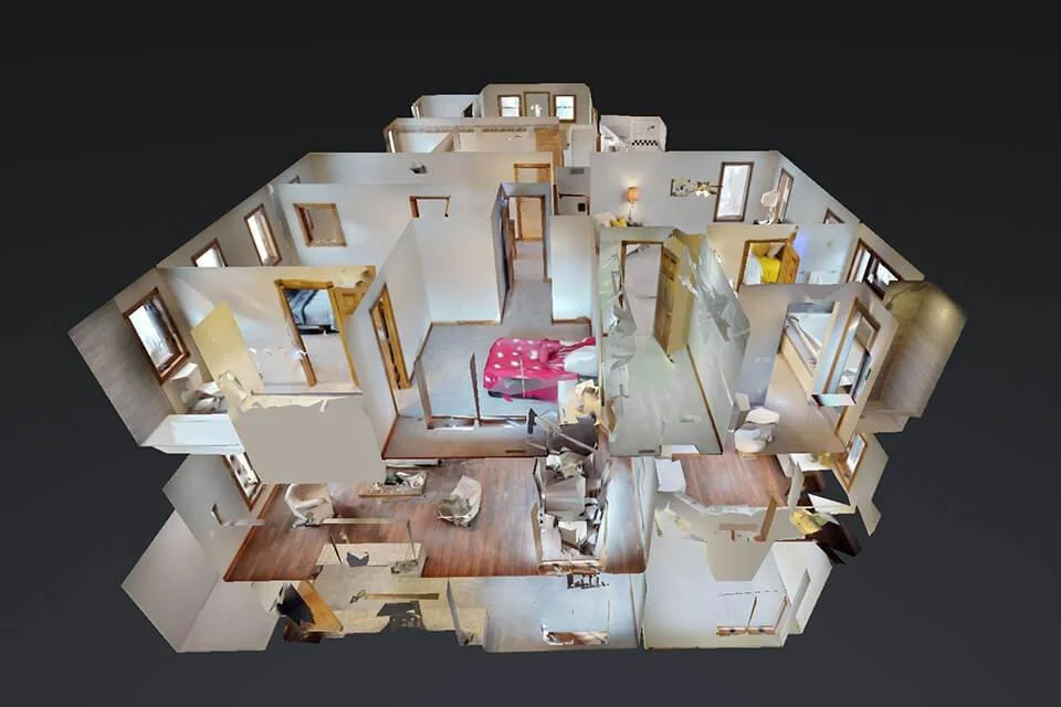 A 3D model of a house interior showing multiple bedrooms, living areas, and a kitchen with various furniture and decorations.