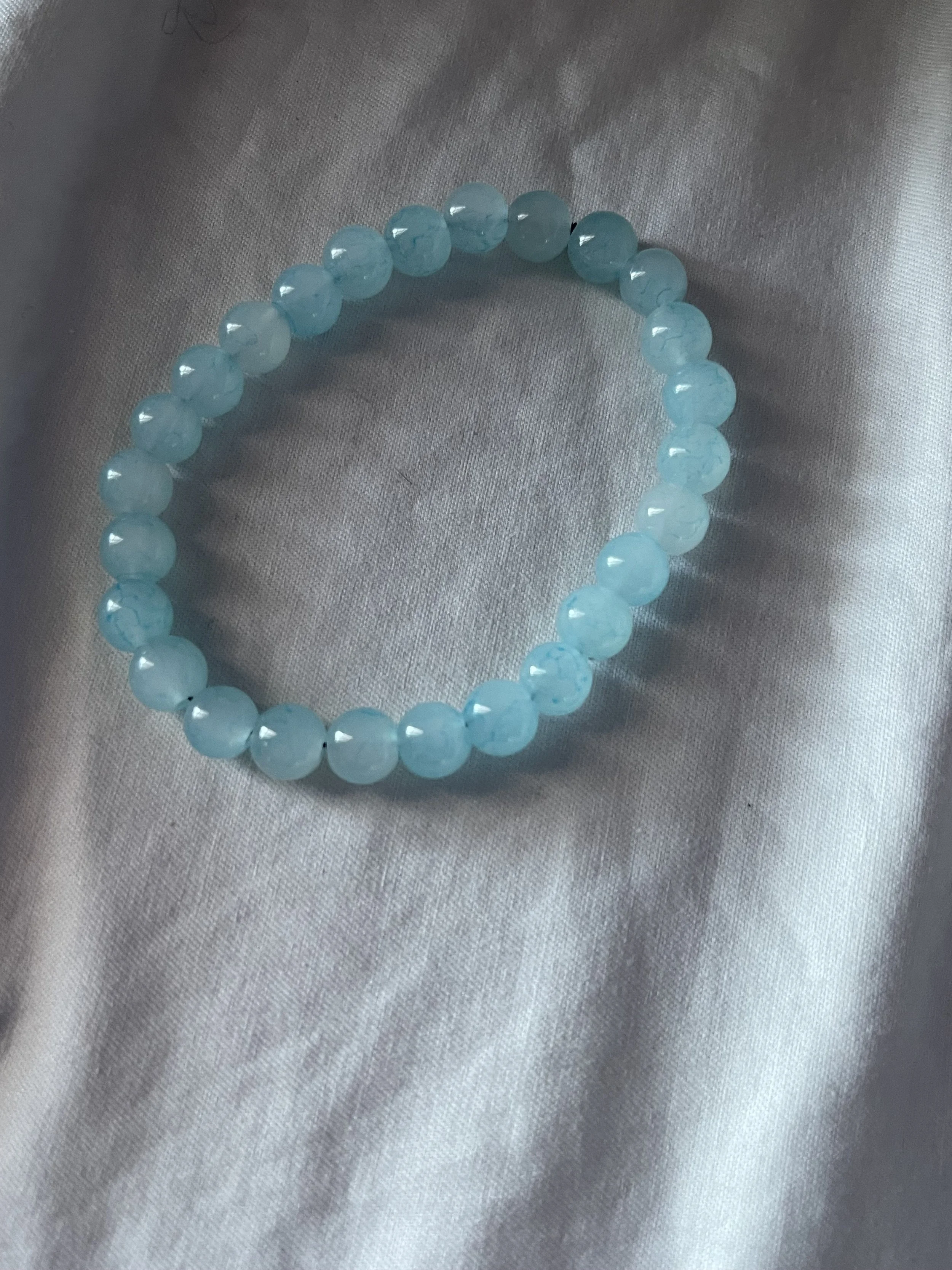 Faded light blue beaded bracelet