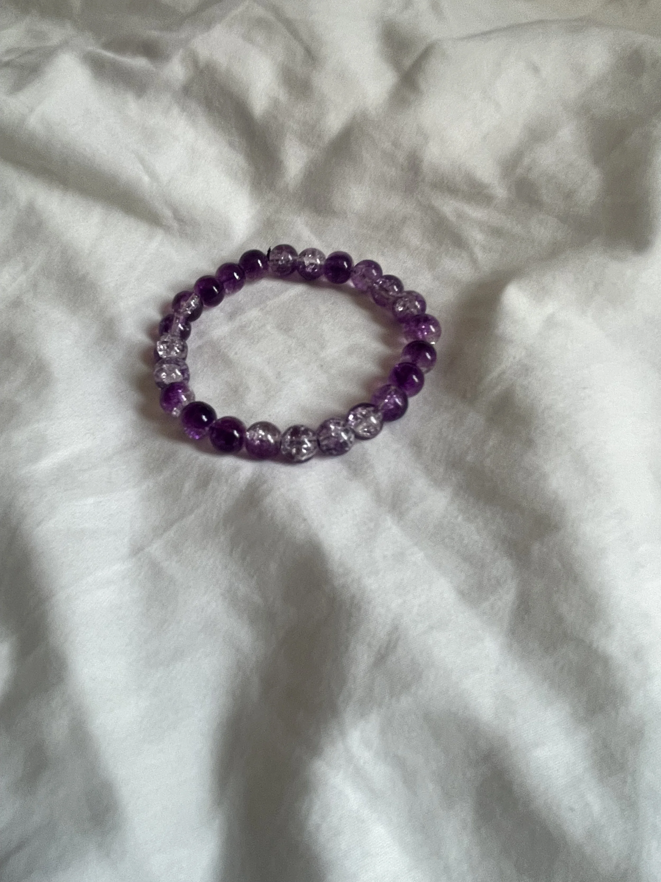Purple and white crackle beaded bracelet