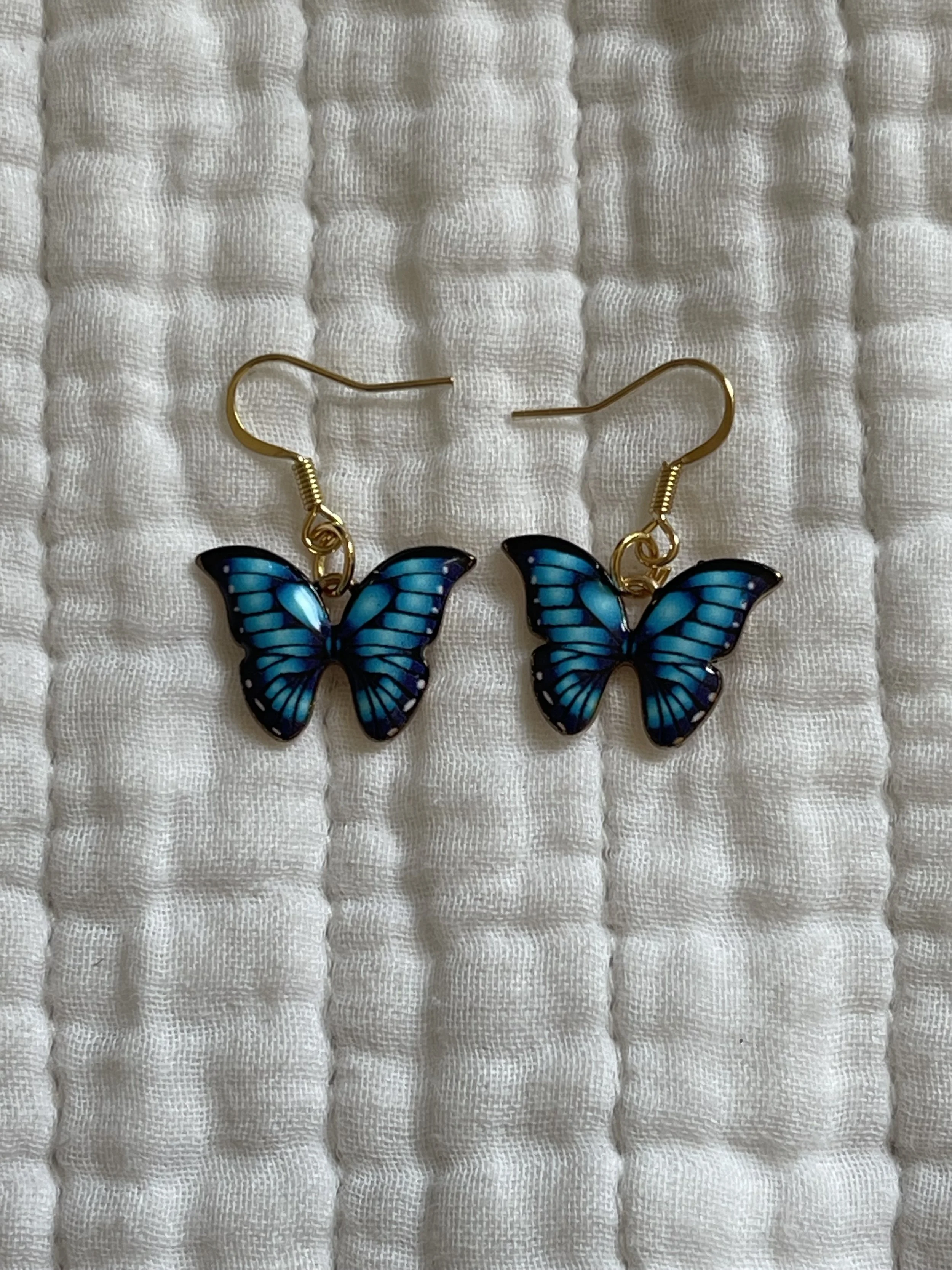 Blue butterfly gold earrings