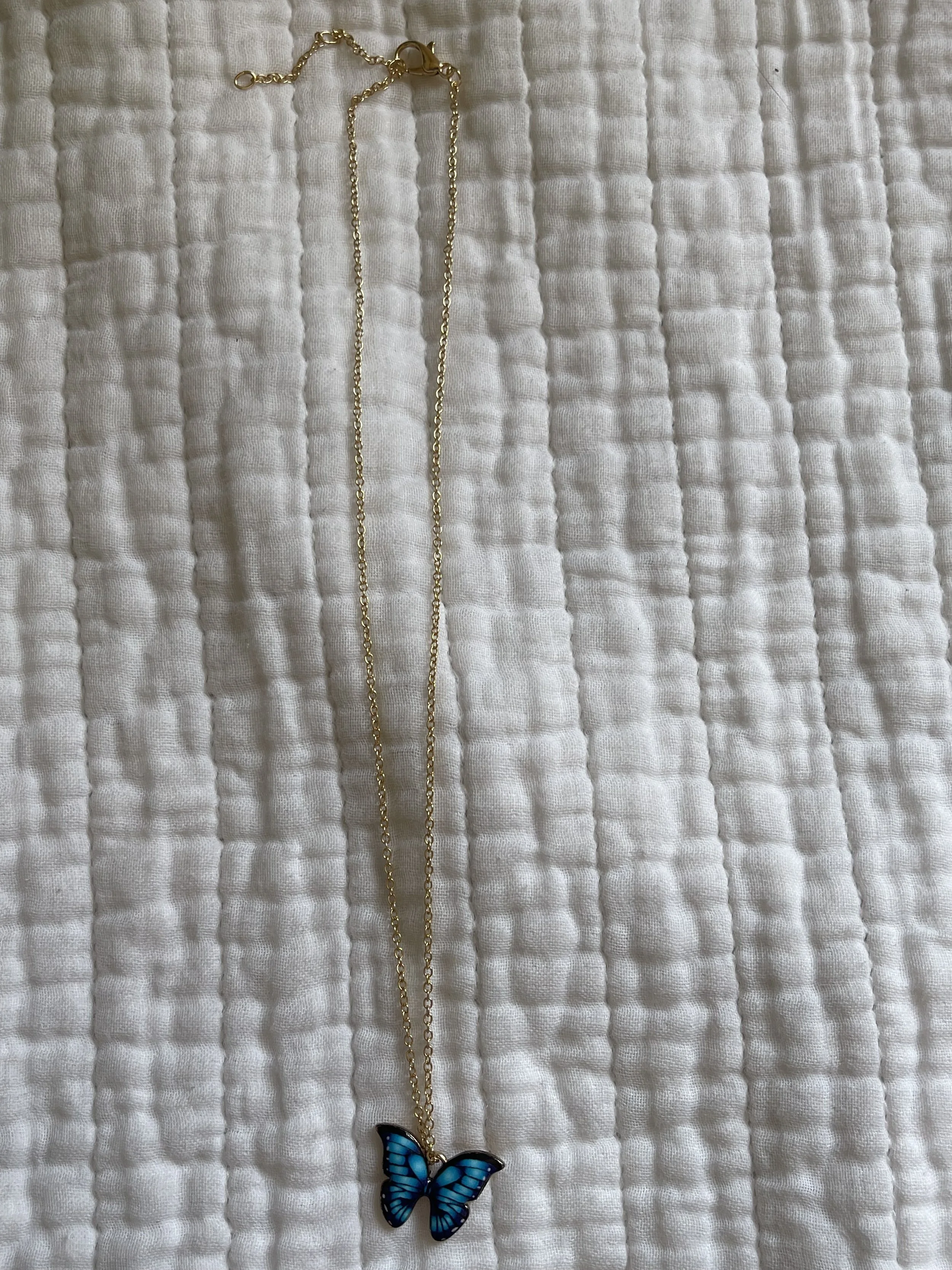 Blue butterfly necklace
