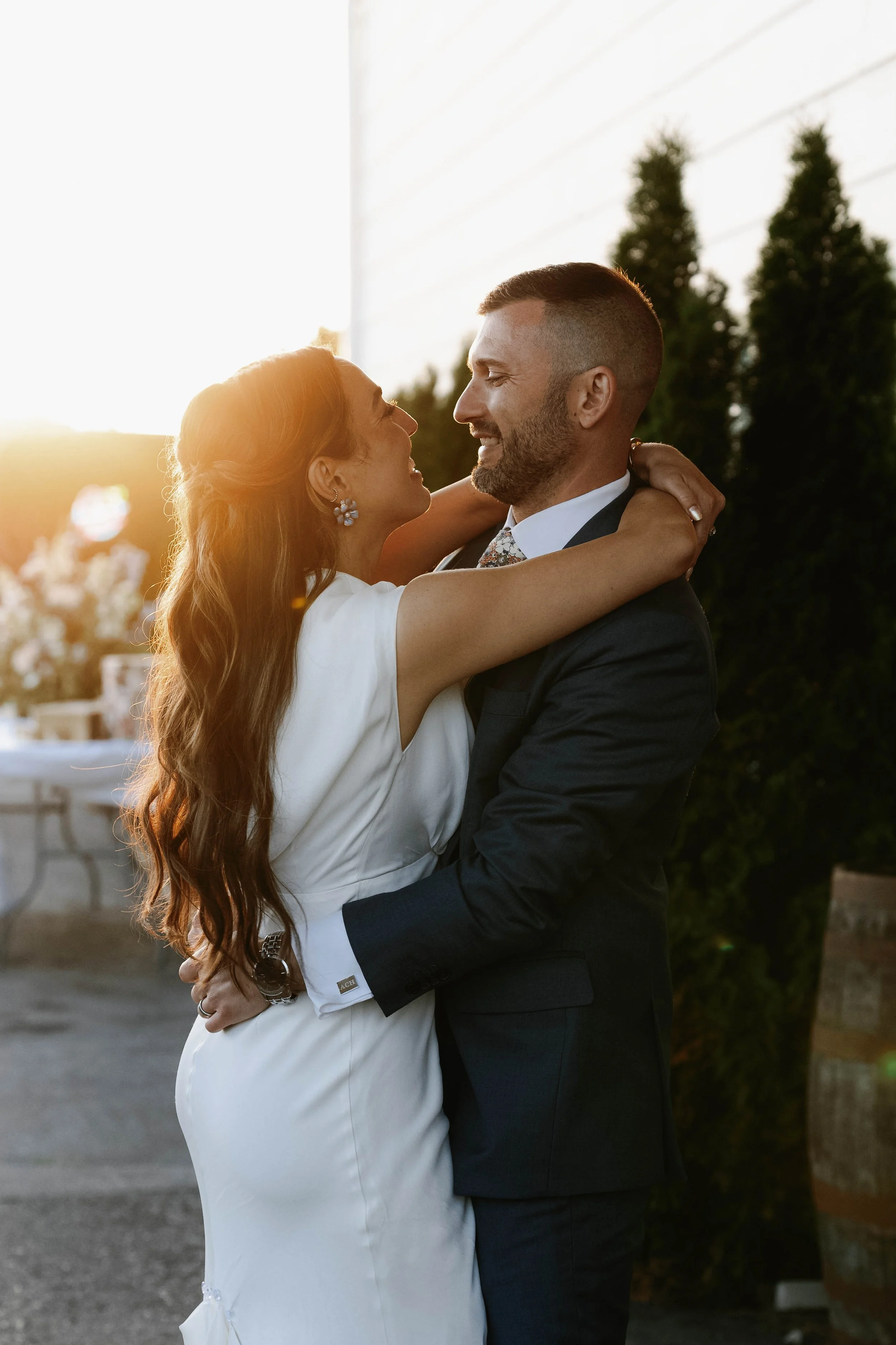 A couple dancing outdoors during sunset first dance wedding at queenslake bnb georgetown kentucky