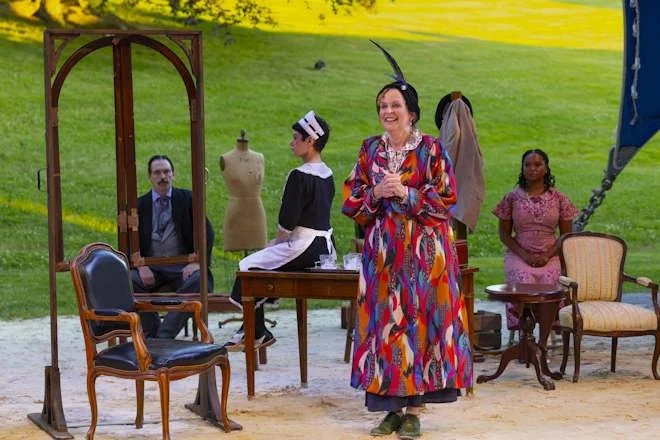 The play begins as the "game pieces (the cast)" have been placed on the board.