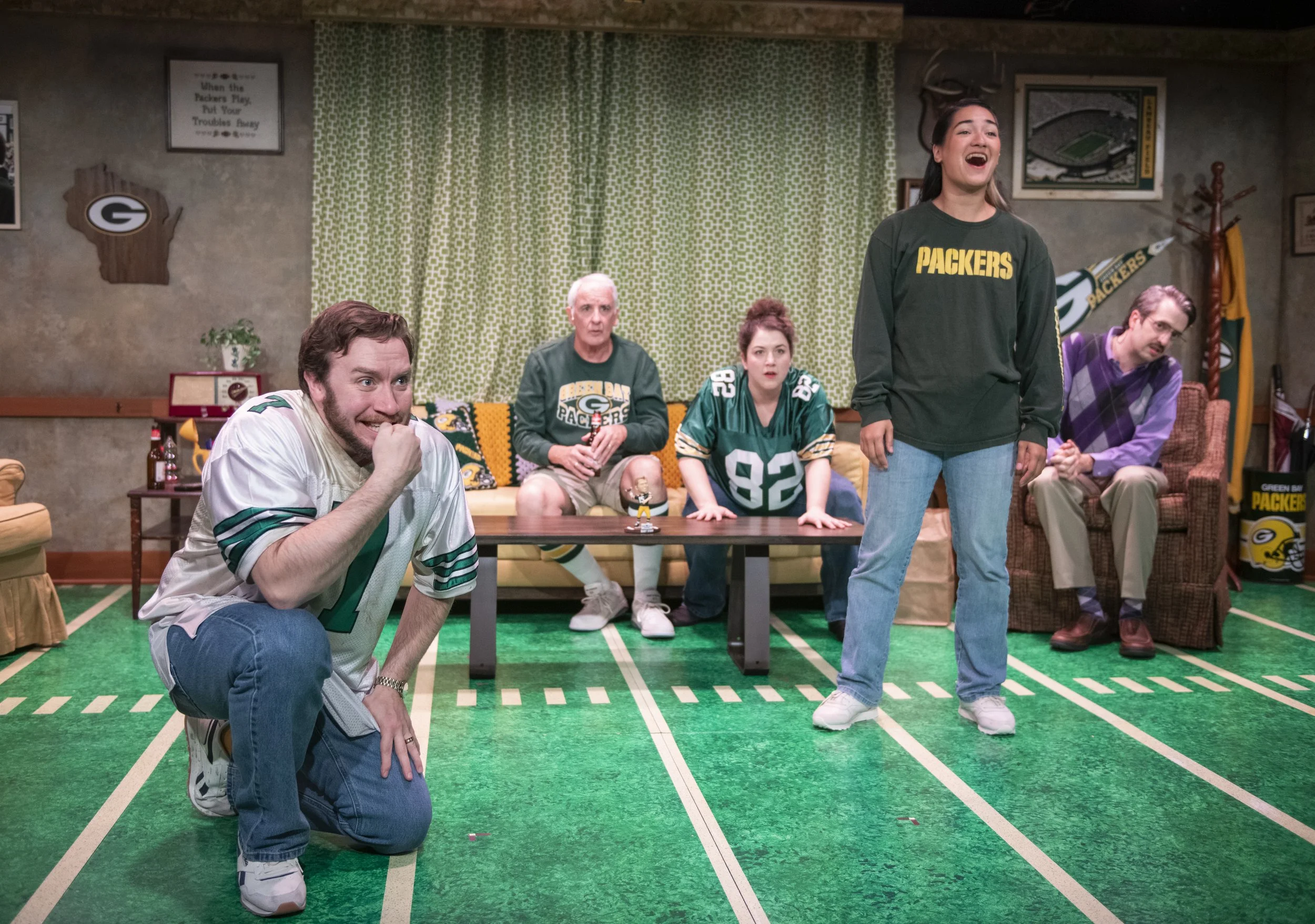 Cordy belts while the cast eagerly put their focus on the game.