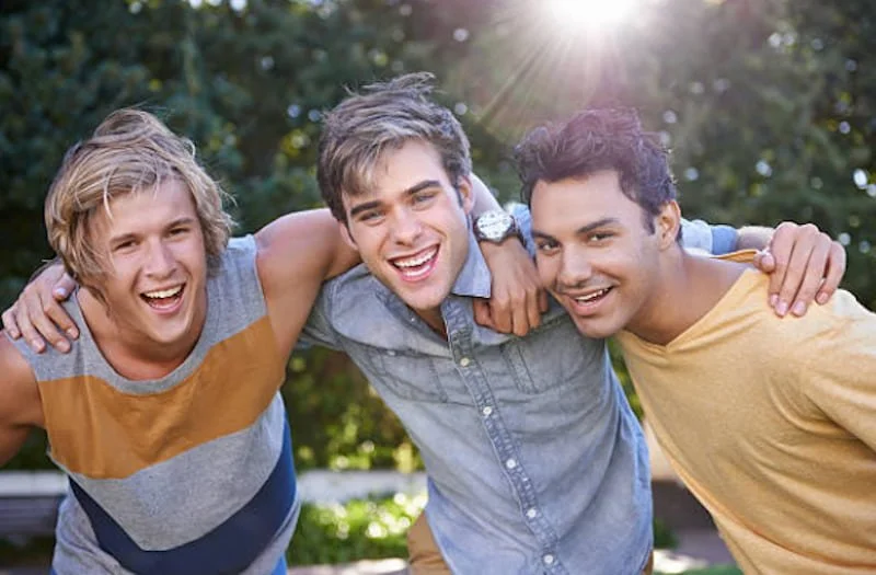 a group of three teen age friends