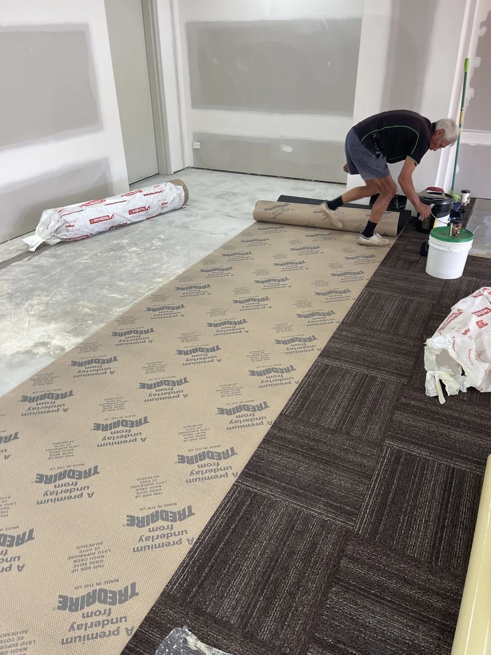 Carpet tiles going down, Australia Post Emerald
