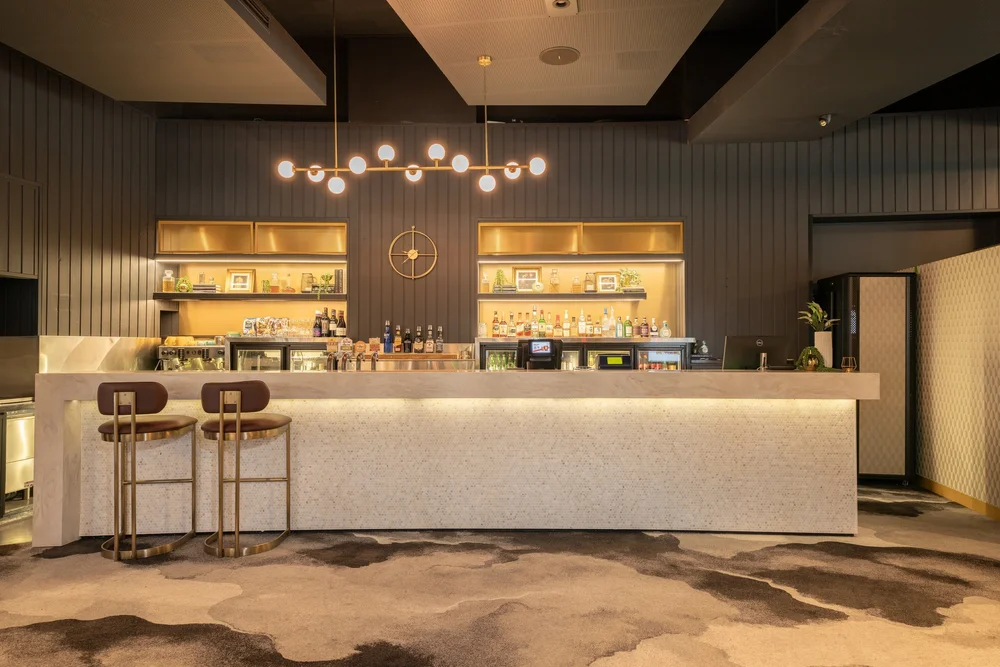 Bar with Corian top and feature pendants at The Normanby Hotel, Red Hill, The Normanby Hotel