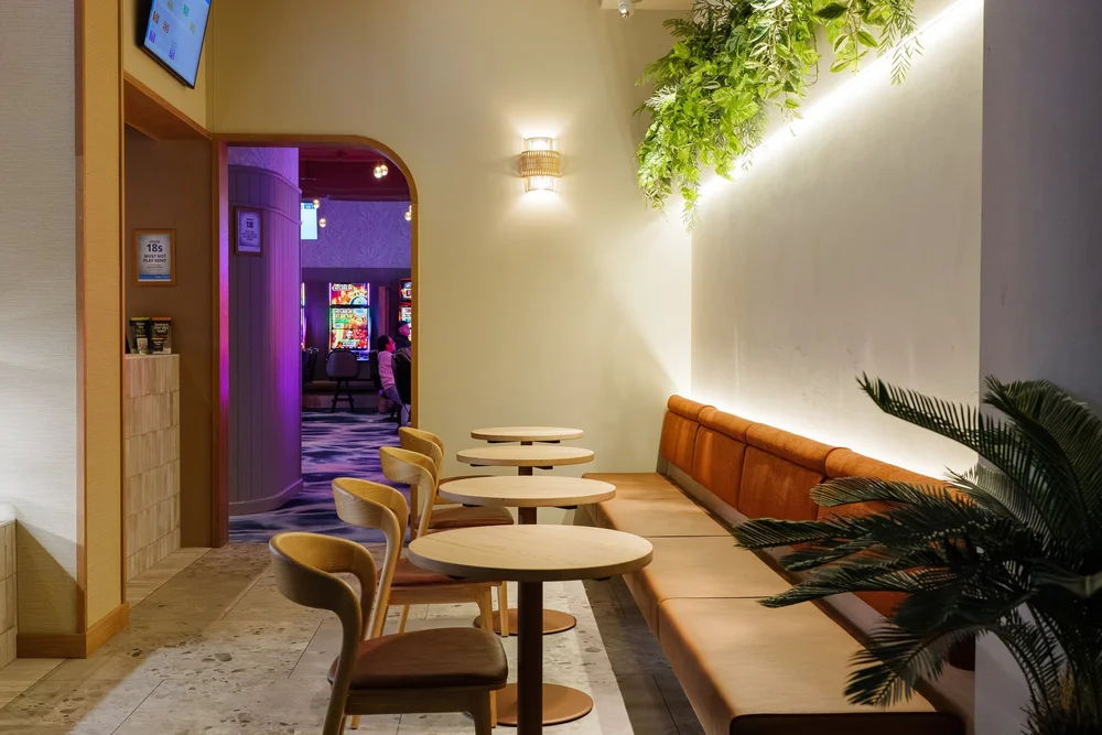 Banquette seating under the planted wall, The Spinnaker