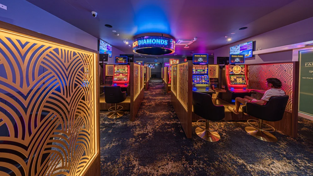 Gaming room with lit timber screens at The Fairfield Hotel, Townsville, The Fairfield Hotel
