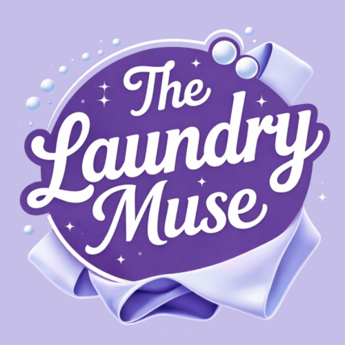 Logo for The Laundry Muse with purple background, white text, surrounded by bubbles and a light blue fabric ribbon.