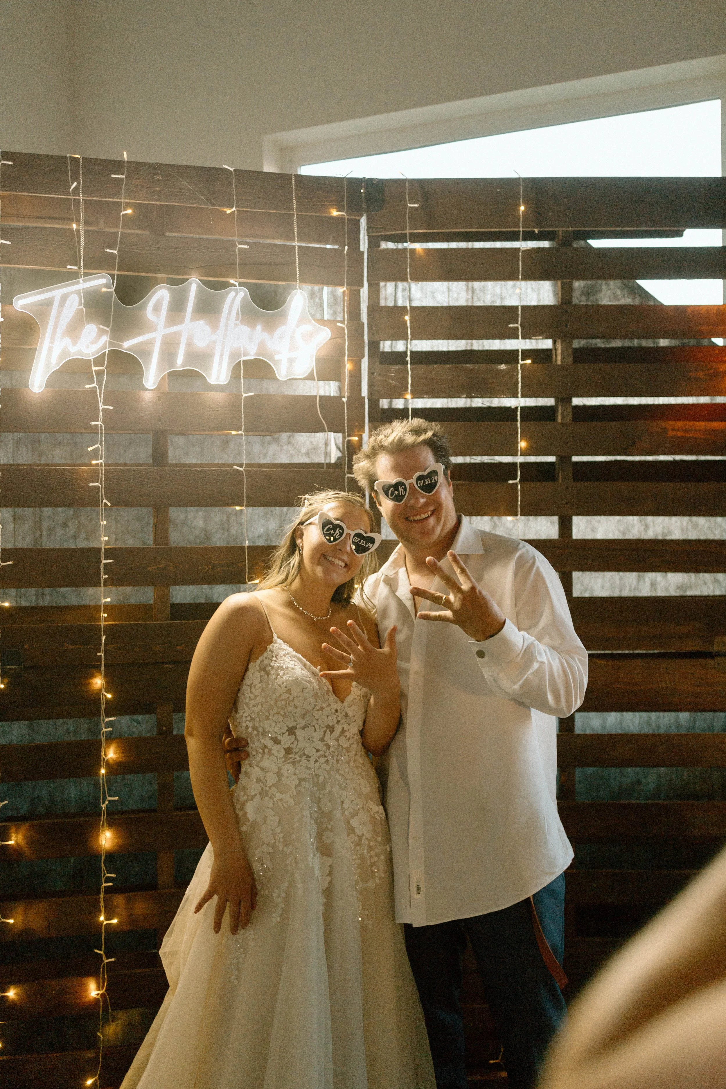 married-couple-at-their-reception-with-sunglasses-on