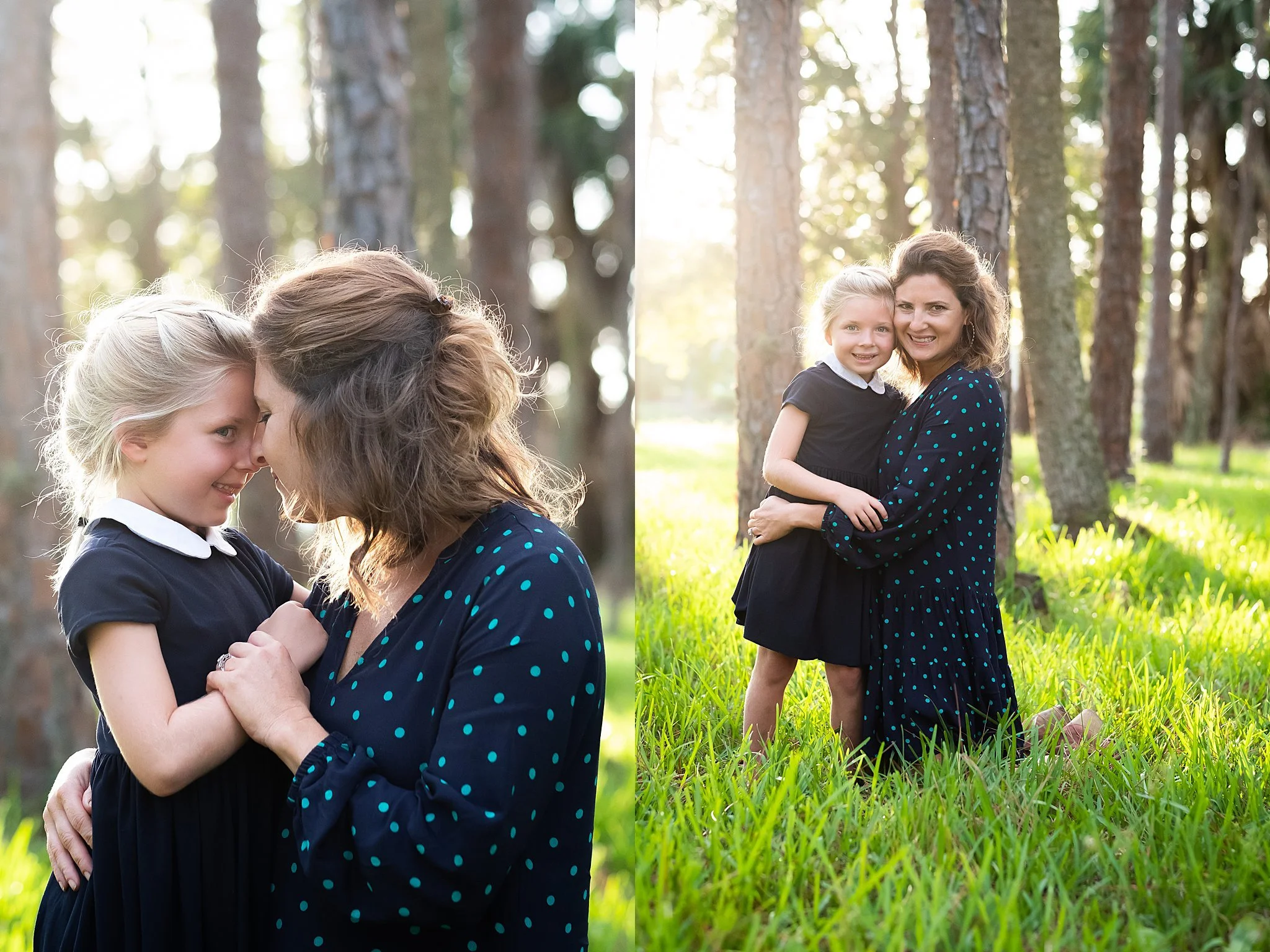 A woman and a young girl hugging in a forest with sunlight streaming through trees.