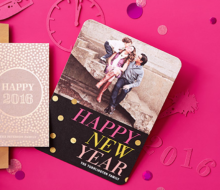 A New Year's greeting card with the message "Happy New Year 2016" and a photo of a couple sitting on a ledge, on a pink background with decorative elements.