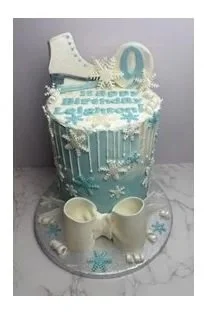 Custom Ice Skate Birthday Cake- 6 inch, 6 layer- vanilla cake, oreo buttercream filling, vanilla buttercream and fondant decorations