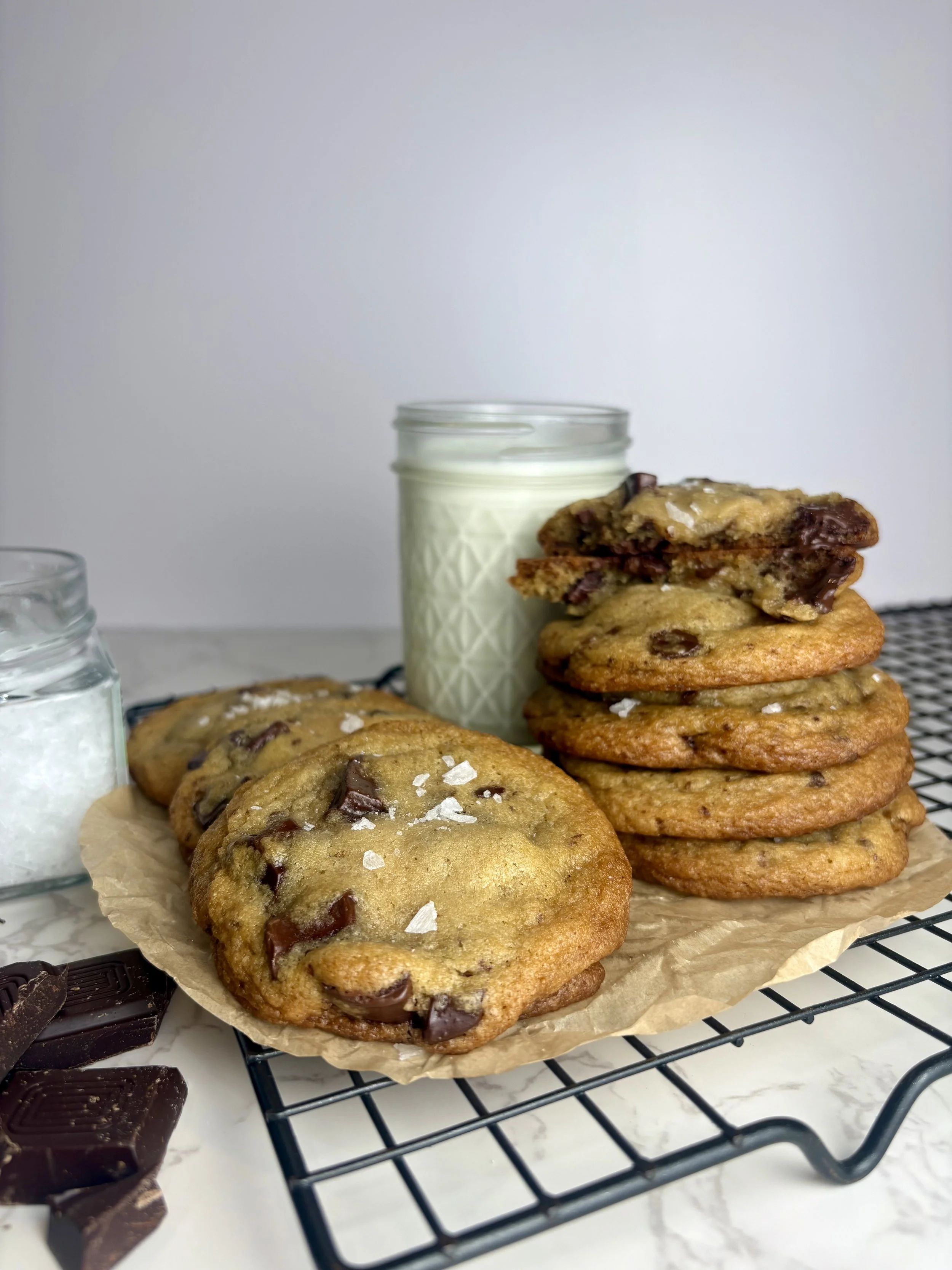 Brown Butter Chocolate Chip Cookie- made with rich brown butter for a deep caramelized flavor, these cookies are soft in the center, lightly crisp on the edges, filled with semi sweet and dark chocolate chunks, and topped with flaky sea salt.
