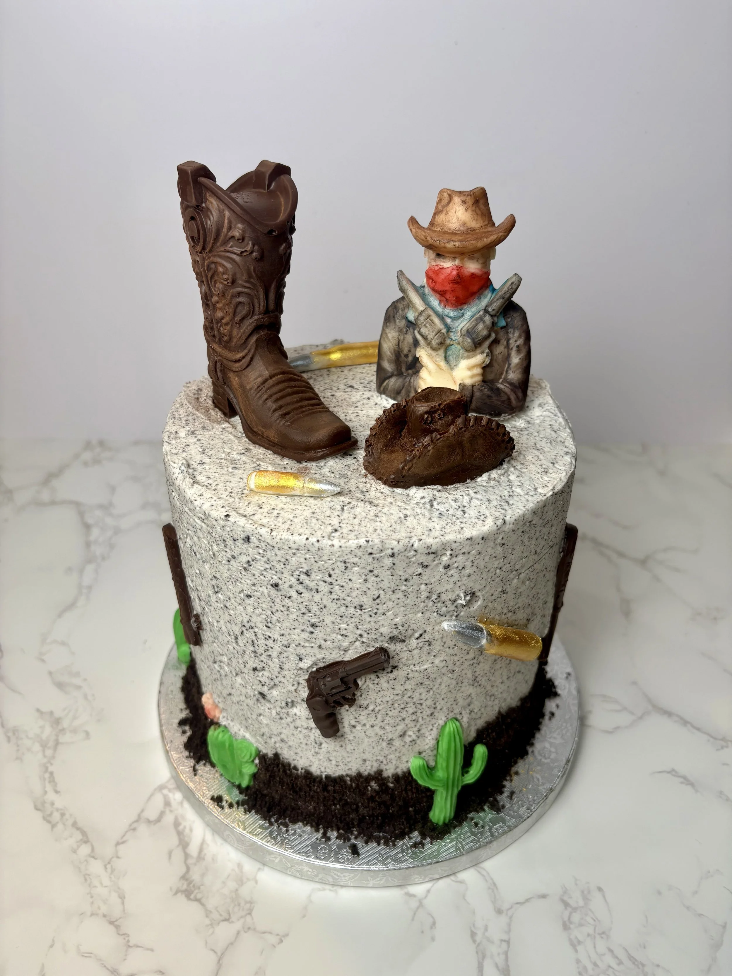 Custom Bandit Cake, all decorations made from chocolate and/ or marshmallow fondant
