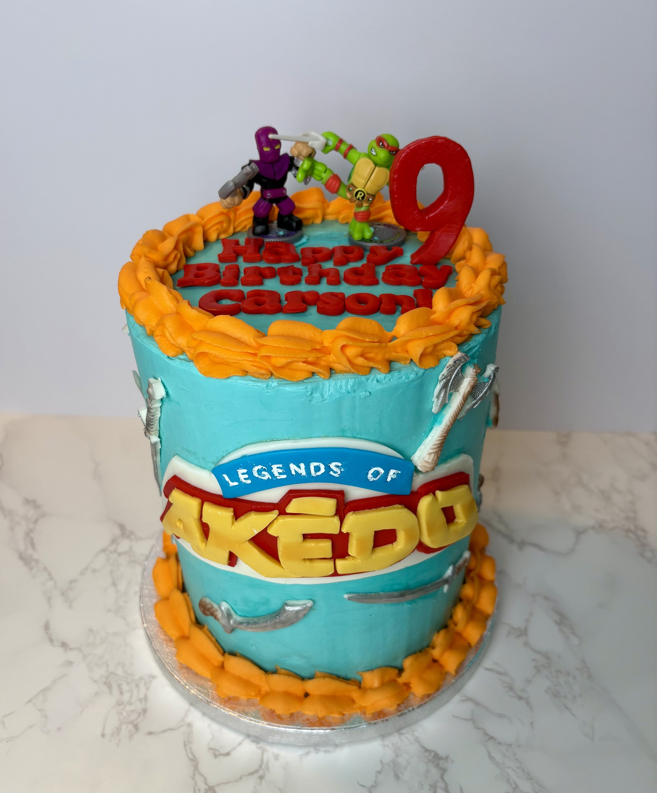 Custom 6 inch cake with Legends of Akedo decor