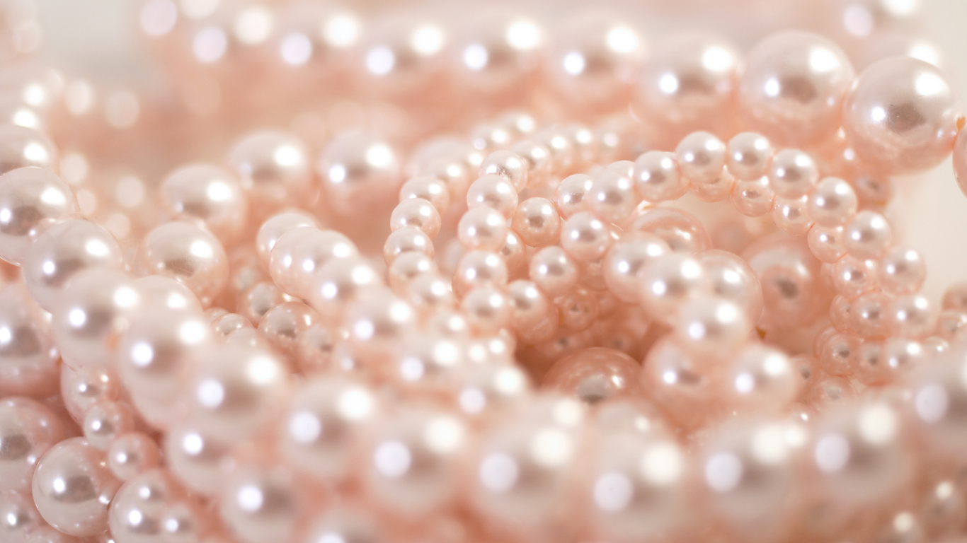 Close-up of pink pearl necklaces or beads.