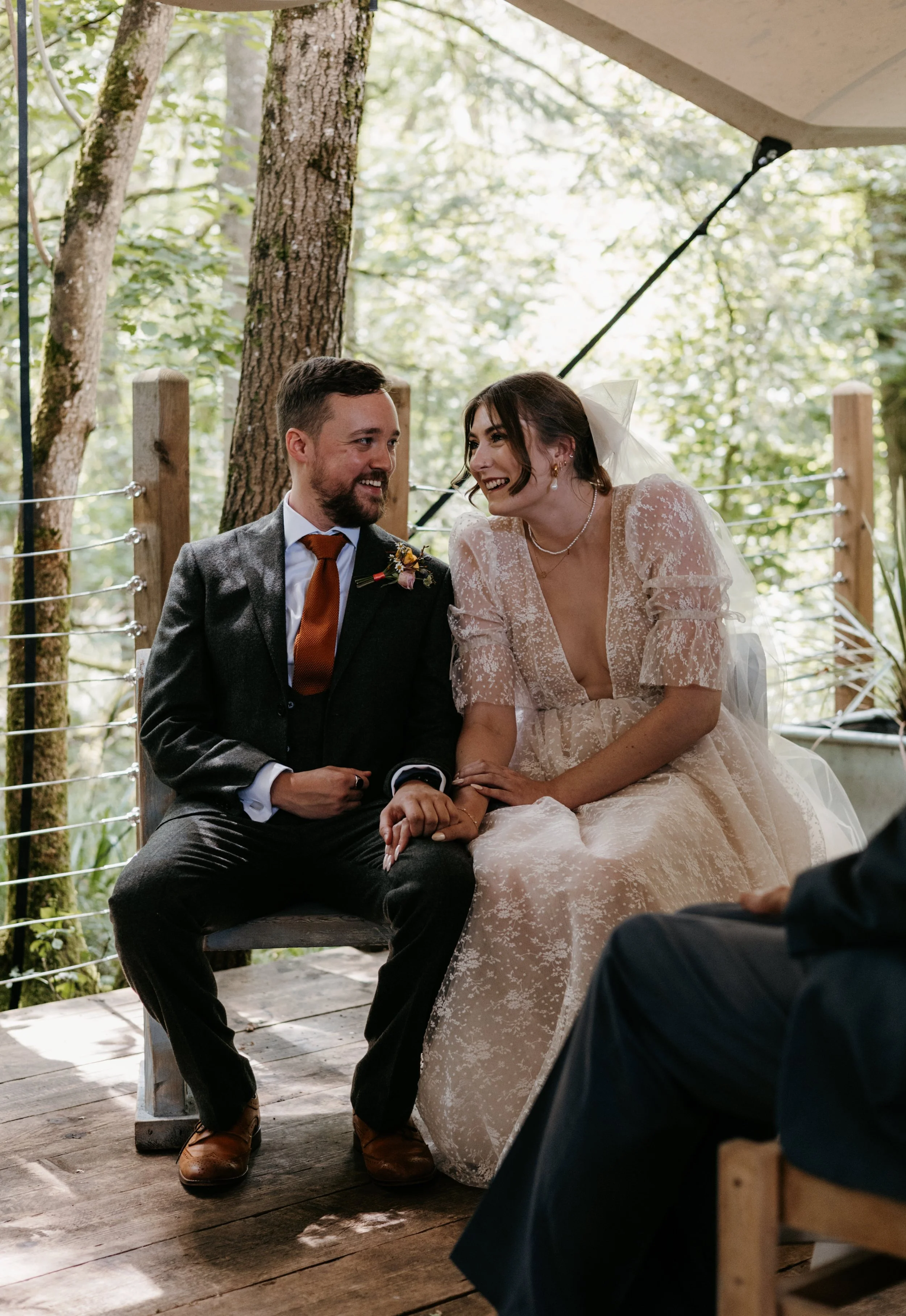 Wedding celebrant chatting with couple during personalised ceremony planning meeting