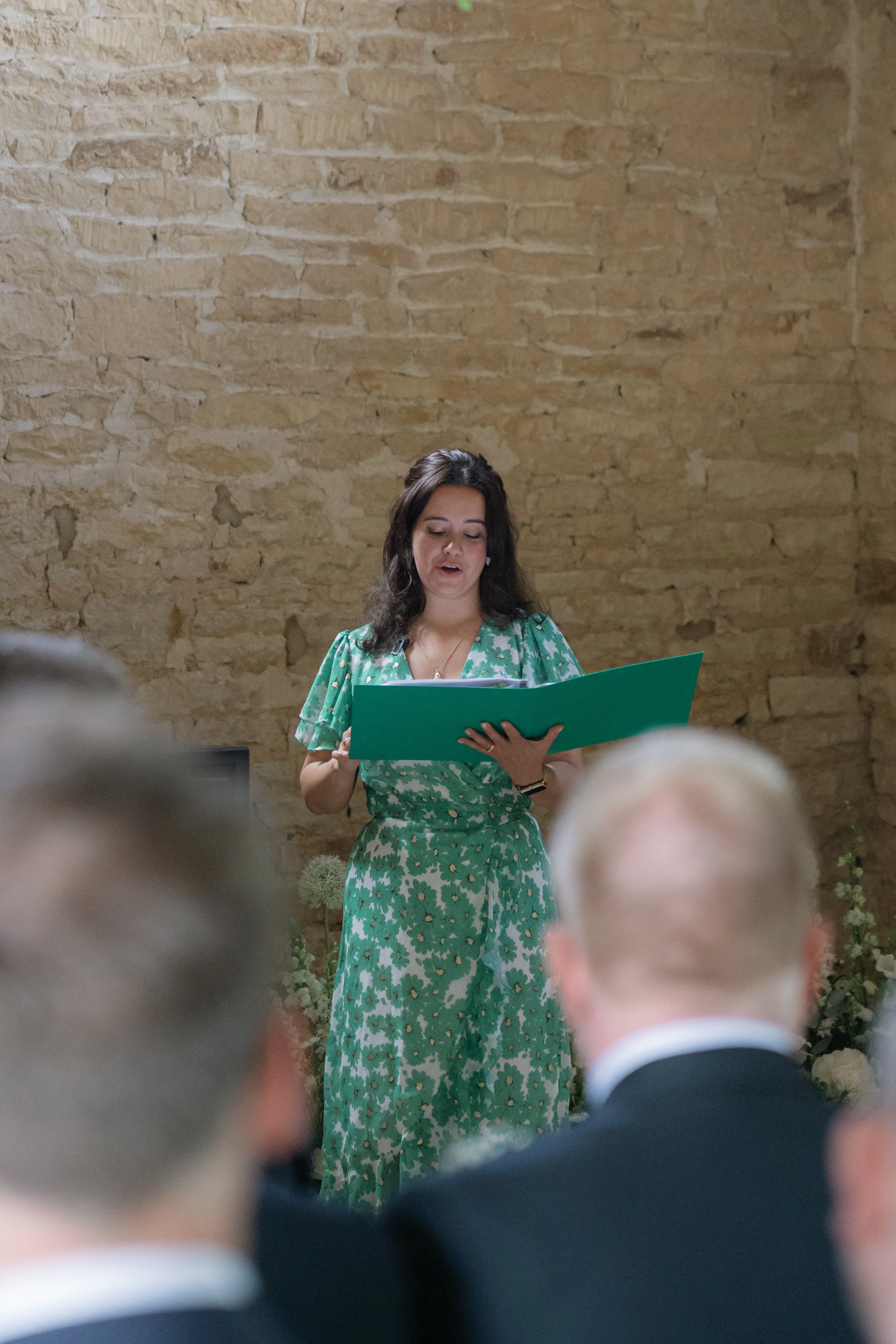 Couple sharing personal vows during a relaxed, bespoke wedding ceremony