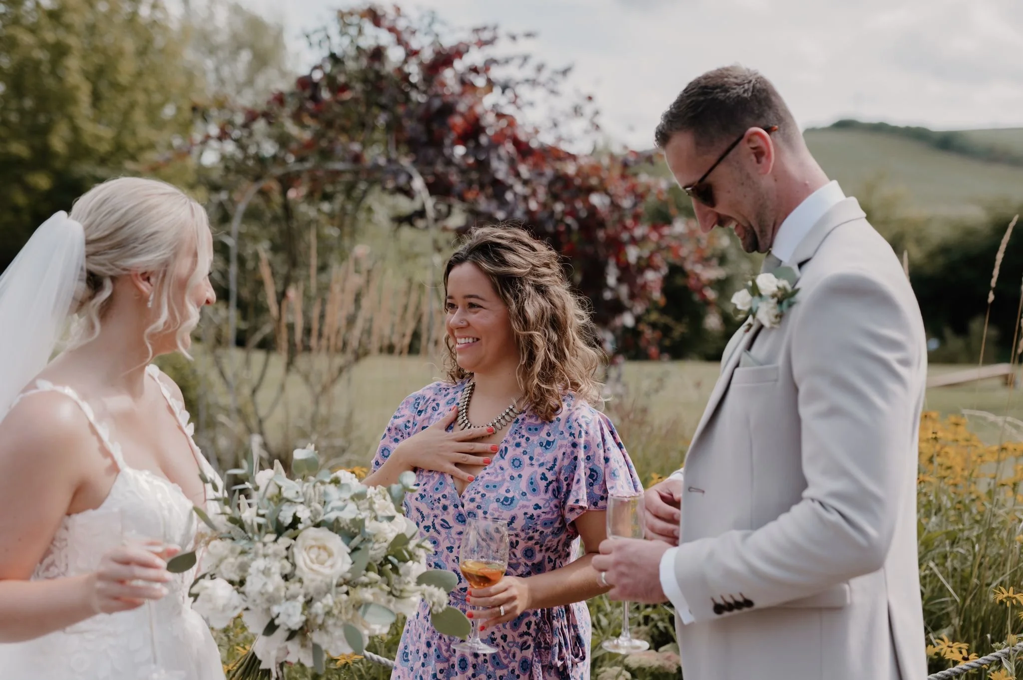 Intimate modern wedding ceremony with celebrant creating a calm, joyful atmosphere