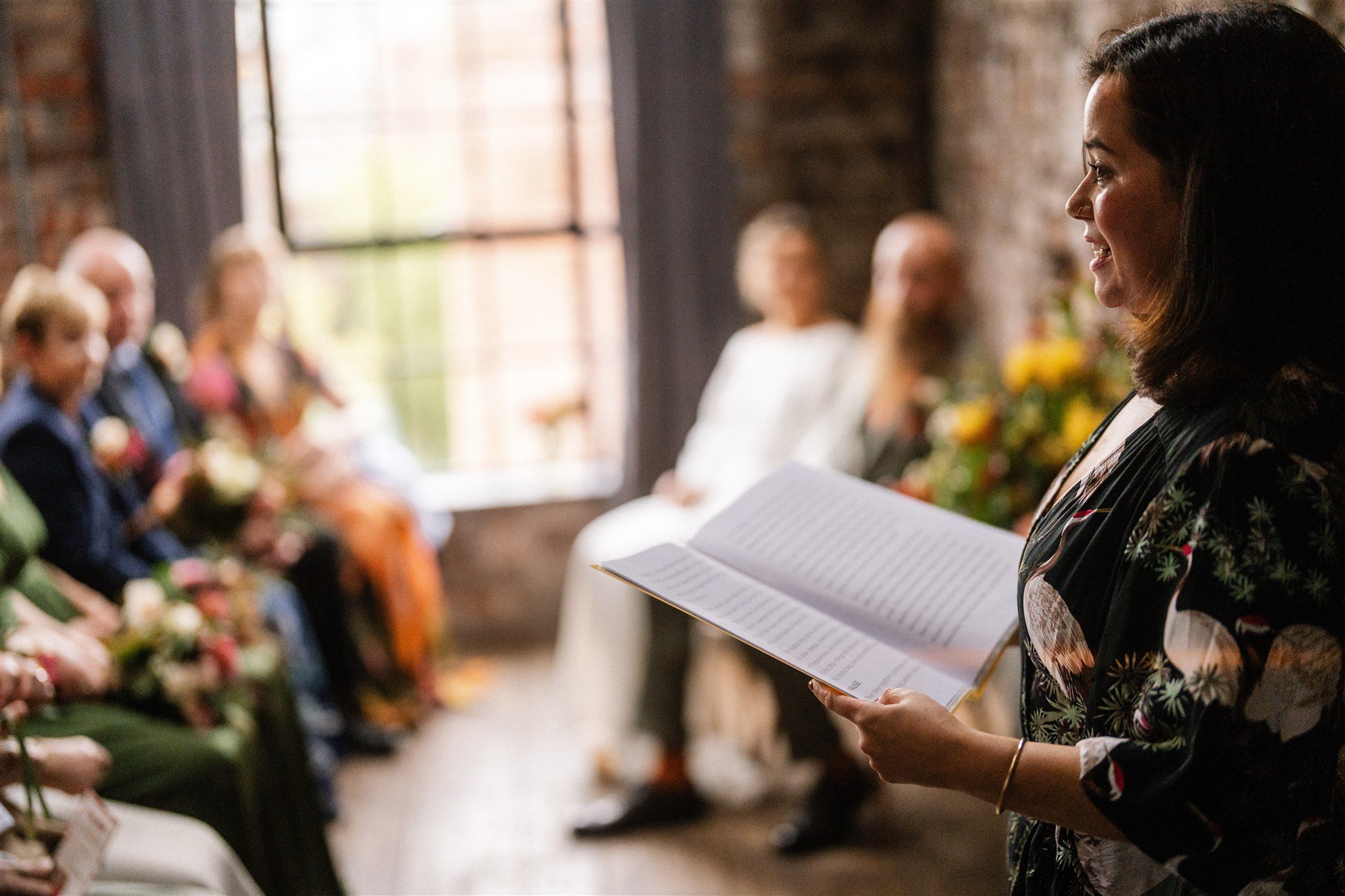 Couple renewing vows in a modern, non-traditional ceremony with celebrant