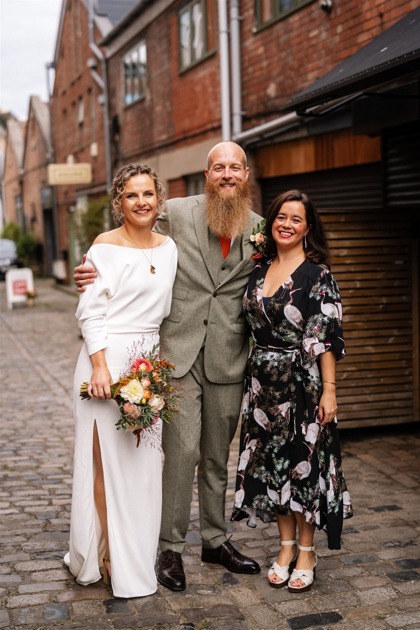 Couple smiling through a relaxed, modern wedding ceremony with personalised vows