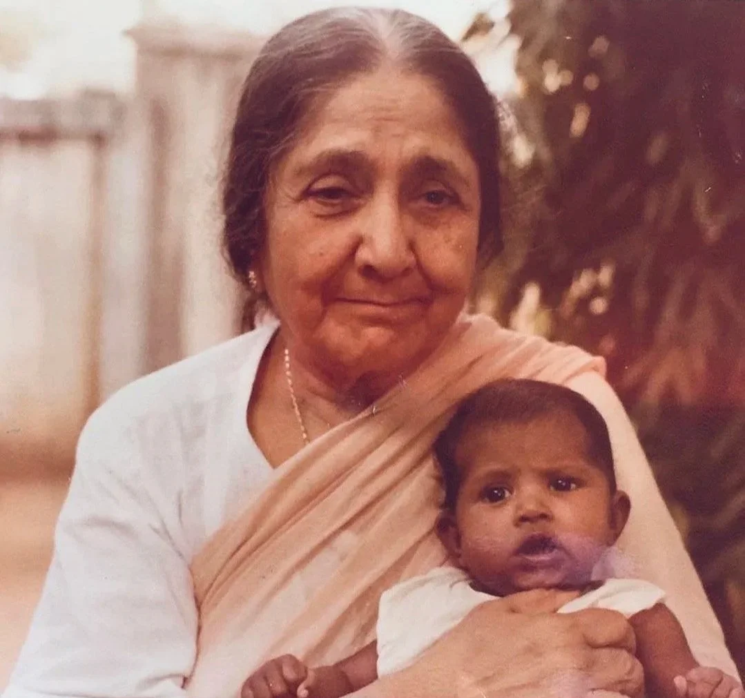 The owner as an infant with her grandmother